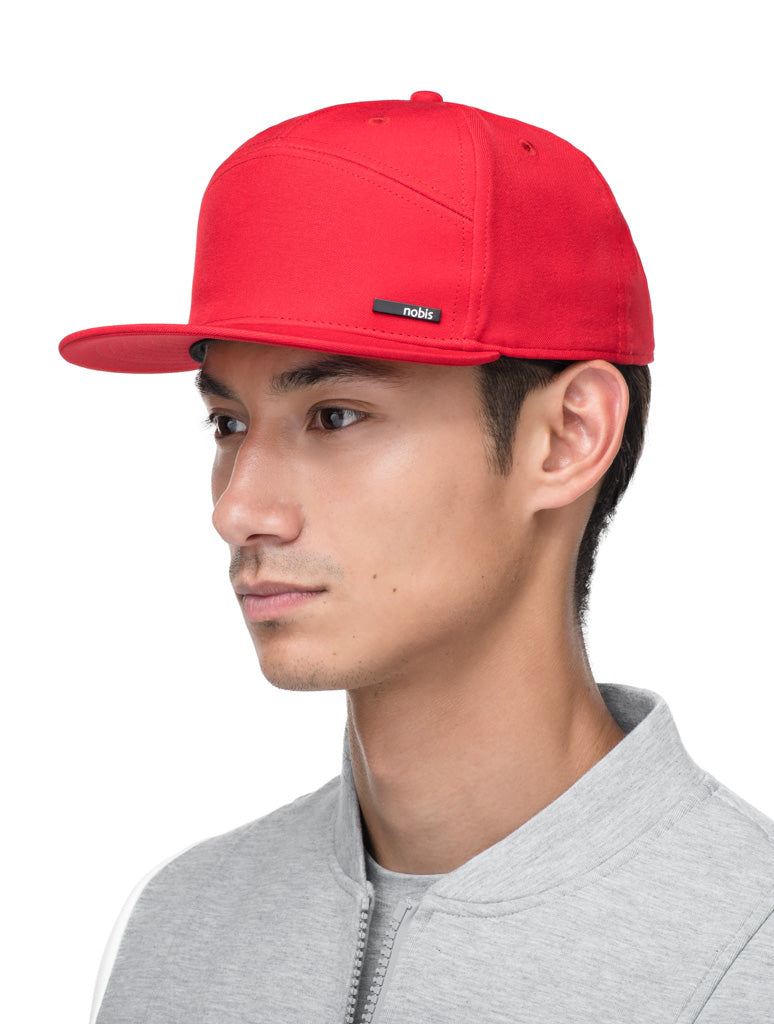 Unisex 7-panel snapback hat with flat brim and structured crown in Red