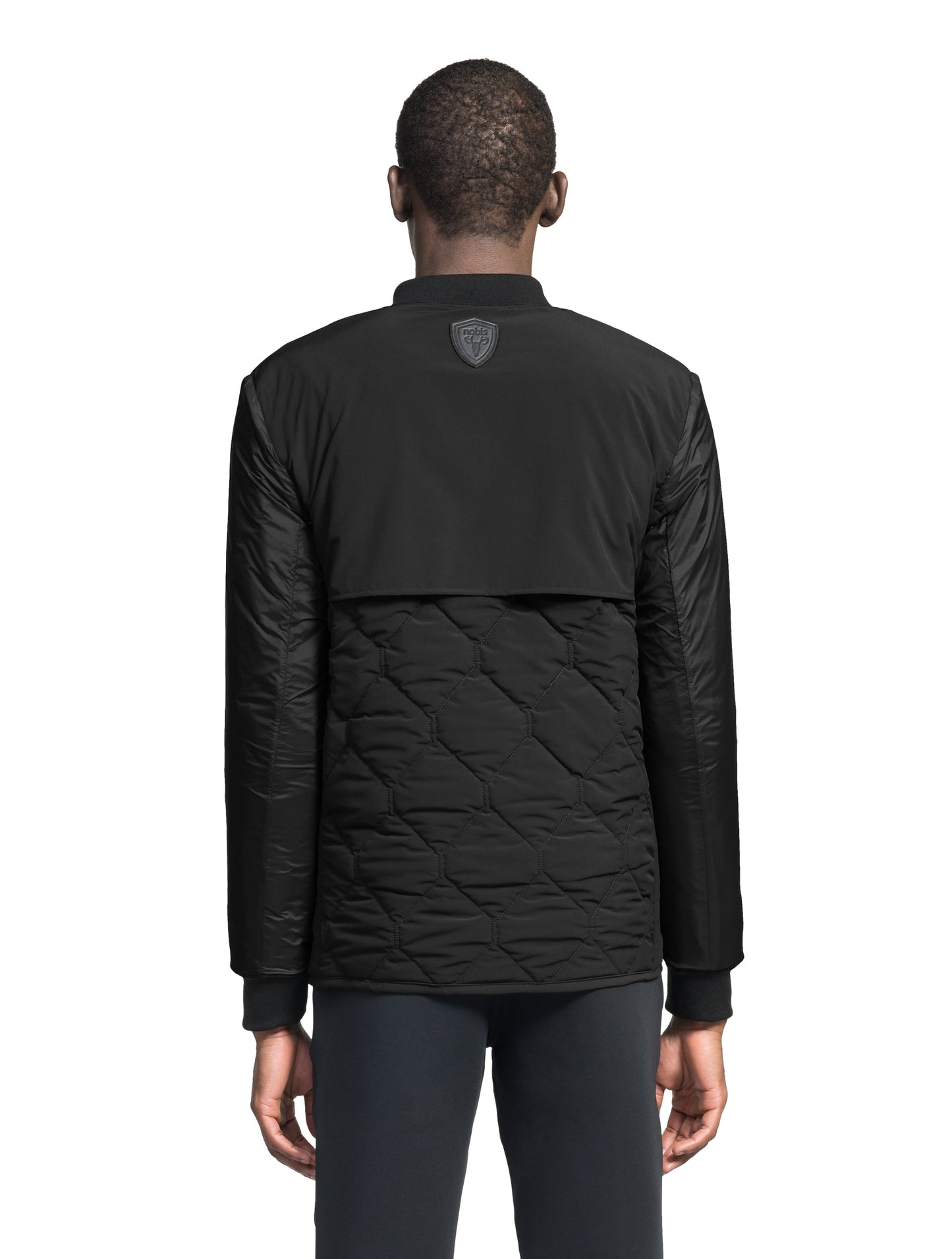 Speck Men's Tailored Mid Layer Jacket in hip length, Primaloft Gold Insulation Active+, diamond quilted body, rib knit collar and cuffs, snap buton front closure, and hidden side-entry zipper pockets at waist, in Black