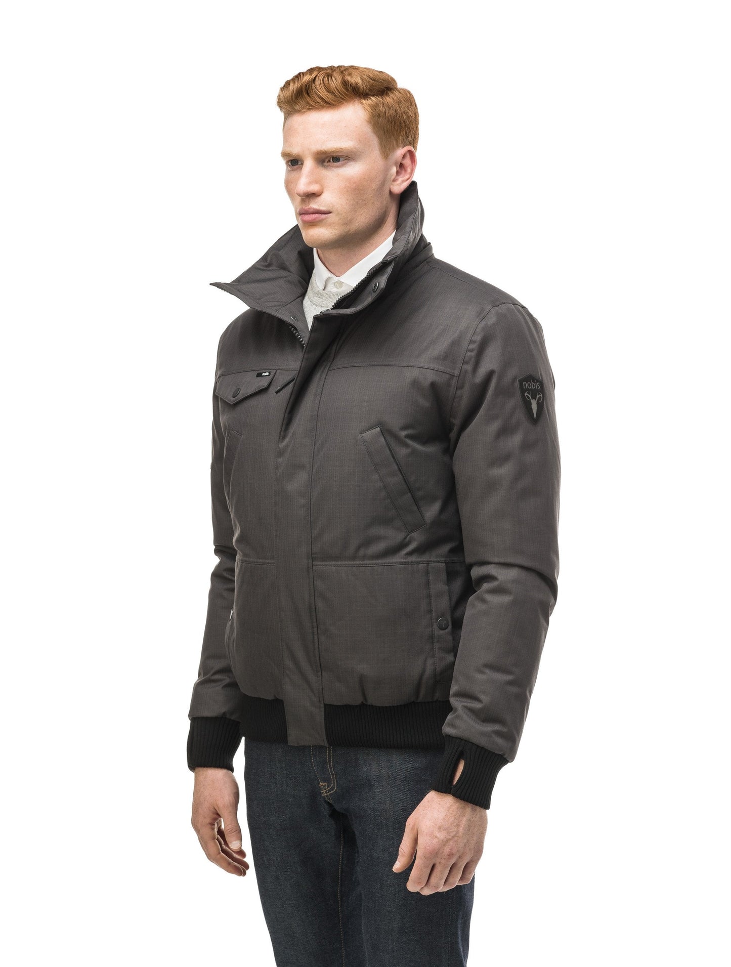 Men's sleek down filled bomber jacket with clean details and a fur free hood in CH Steel Grey