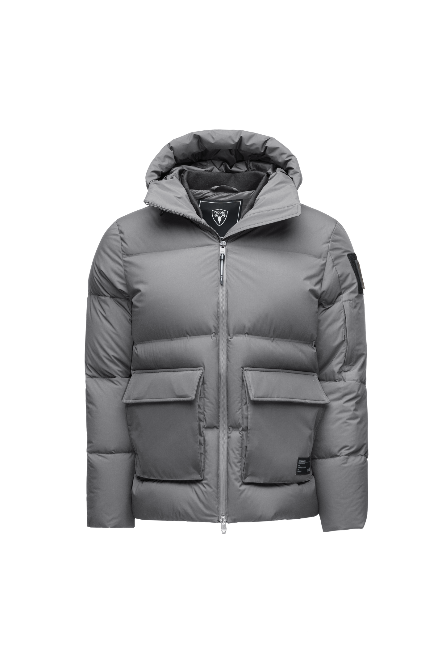 Supra Men's Performance Puffer in hip length, Technical Taffeta and 3-Ply Micro Denier fabrication, Premium Canadian White Duck Down insulation, non-removable down filled hood, centre front two-way zipper, flap pockets at waist, and zipper pocket at left bicep, in Concrete