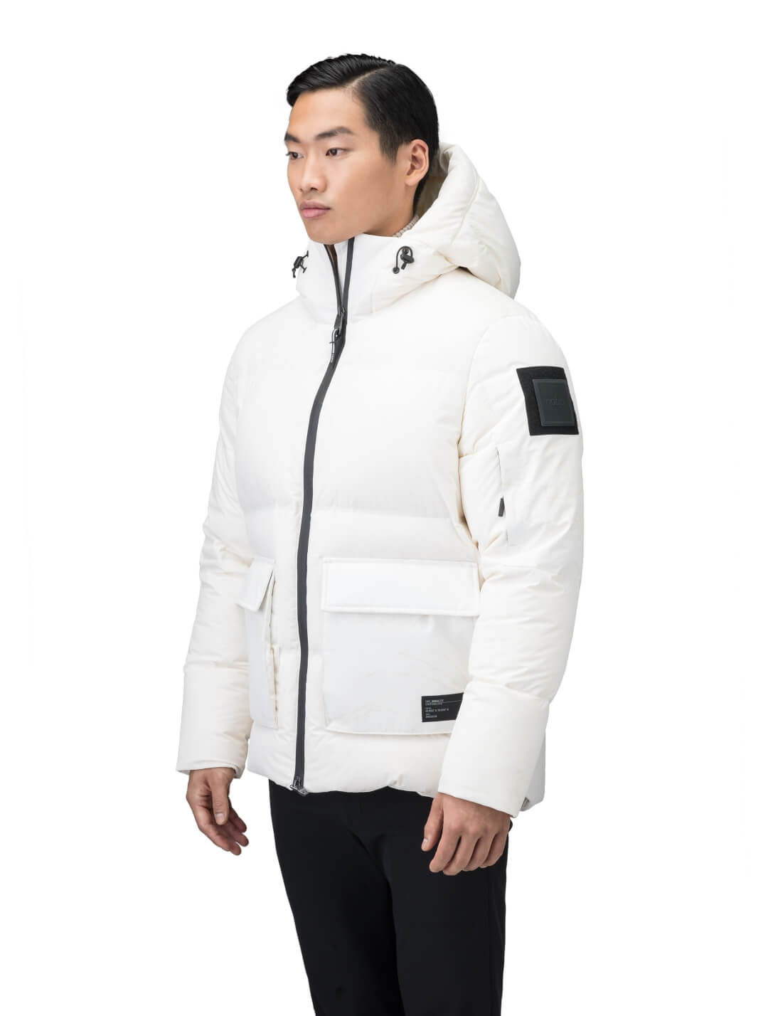 Supra Men's Performance Puffer in hip length, Technical Taffeta and 3-Ply Micro Denier fabrication, Premium Canadian White Duck Down insulation, non-removable down filled hood, centre front two-way zipper, flap pockets at waist, and zipper pocket at left bicep, in Wheat Desert