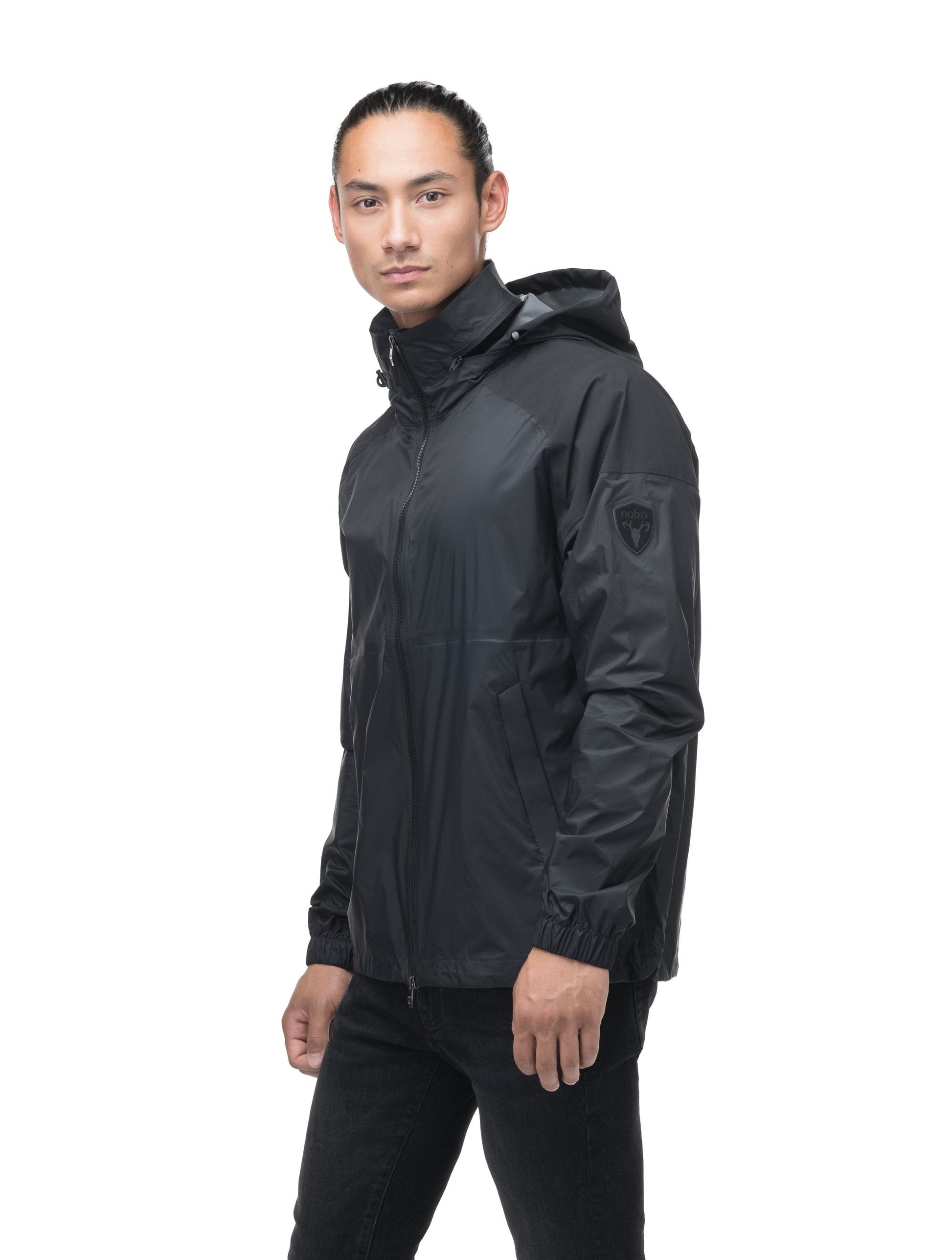 Men's hip length waterproof jacket with tuckable hood and 2-way zipper in Black