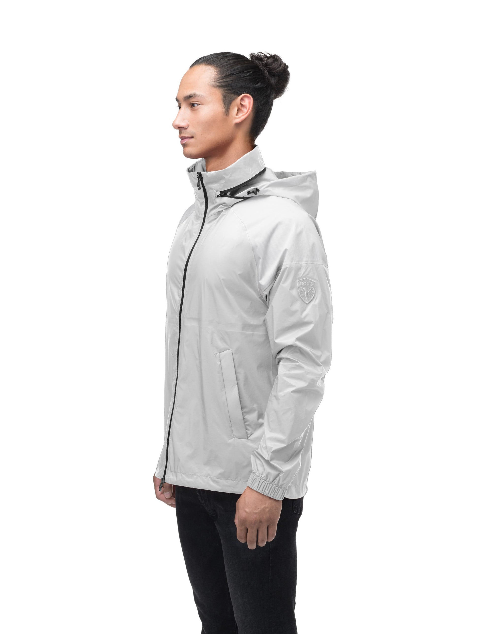 Men's hip length waterproof jacket with tuckable hood and 2-way zipper in Light Grey