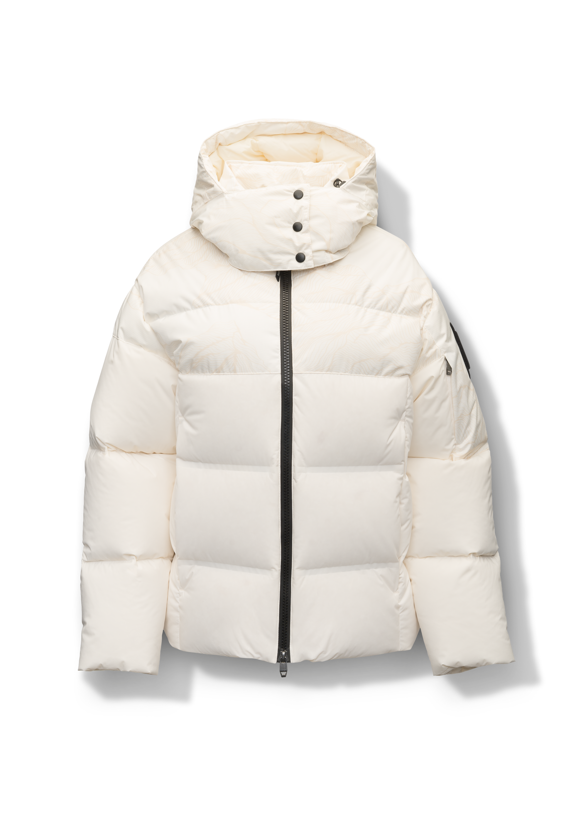 Una Ladies Performance Puffer in hip length, Technical Taffeta and Durable Stretch Ripstop fabrication, Premium Canadian White Duck Down insulation, removable down filled hood, centre front two-way zipper, and side-entry pockets at waist, in Wheat Desert