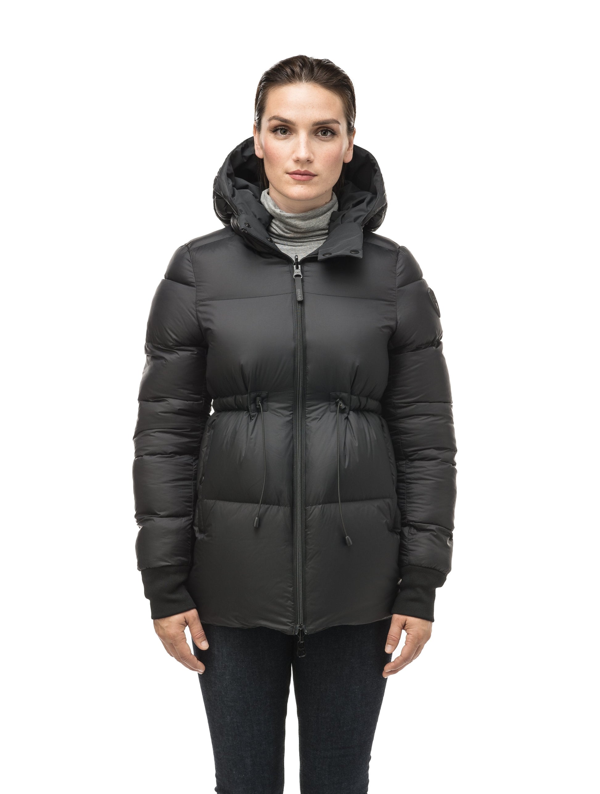 Hip length, reversible women's down filled jacket with waterproof exposed zipper in Black