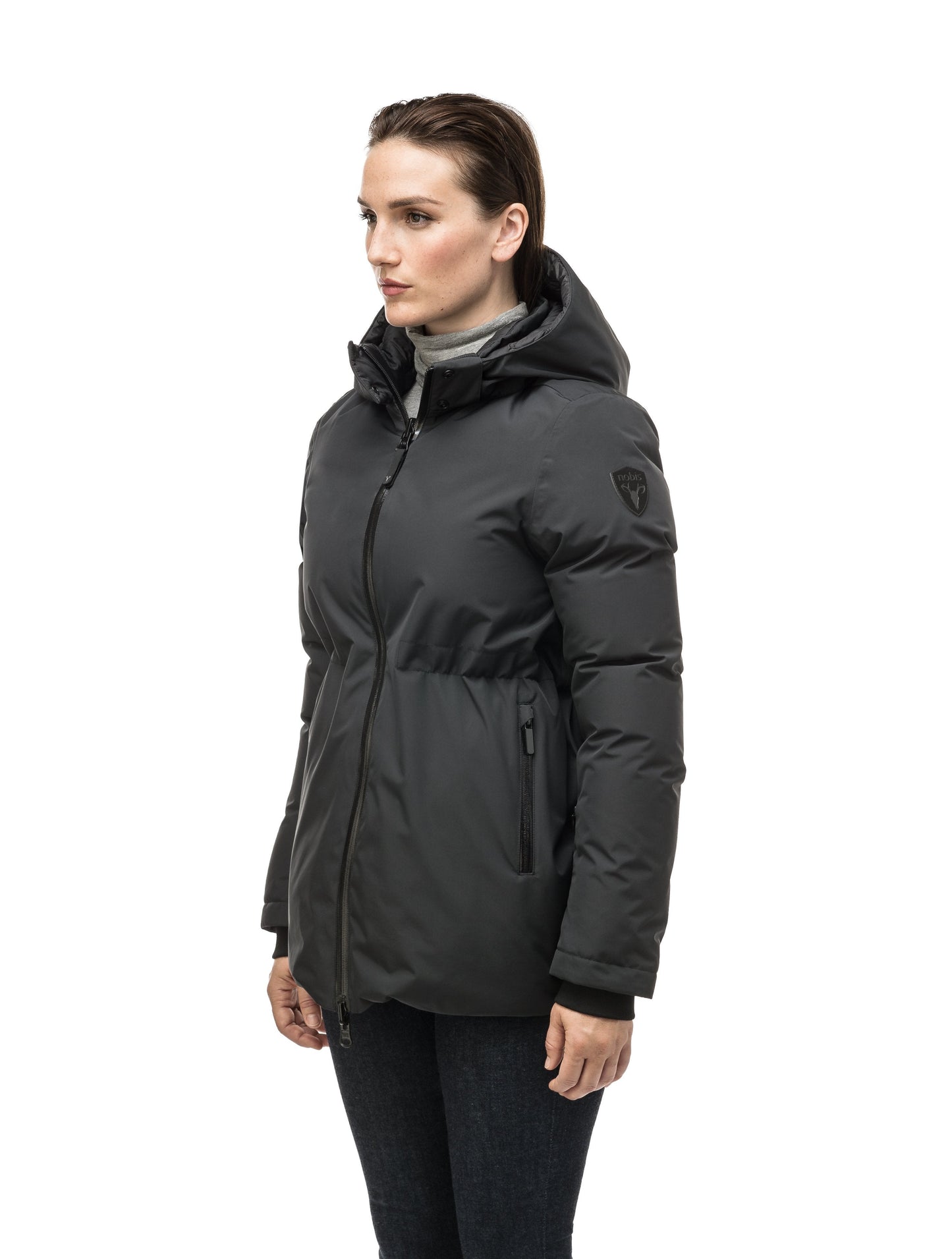 Hip length, reversible women's down filled jacket with waterproof exposed zipper in Black