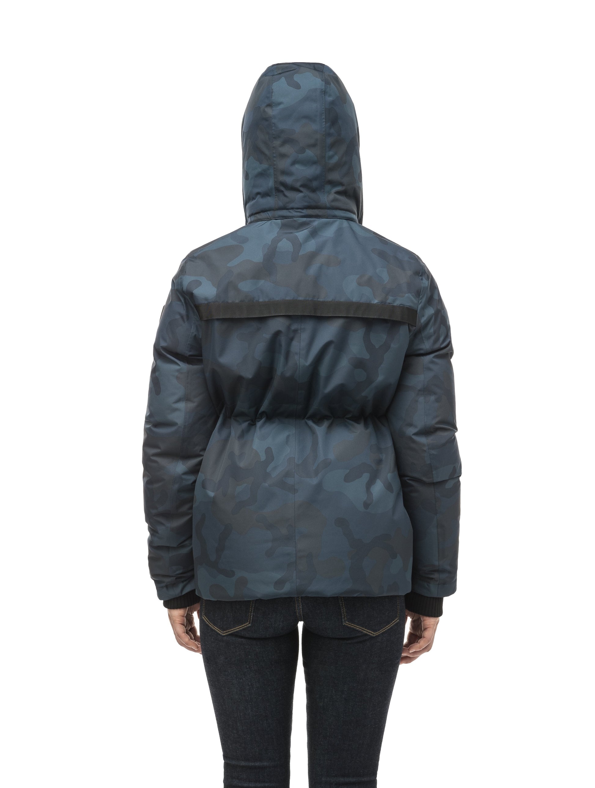 Hip length, reversible women's down filled jacket with waterproof exposed zipper in Navy Camo