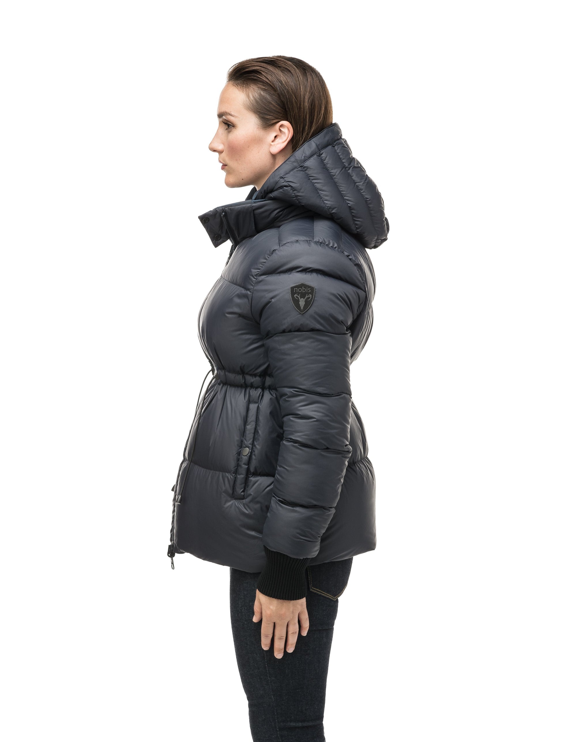 Hip length, reversible women's down filled jacket with waterproof exposed zipper in Navy Camo