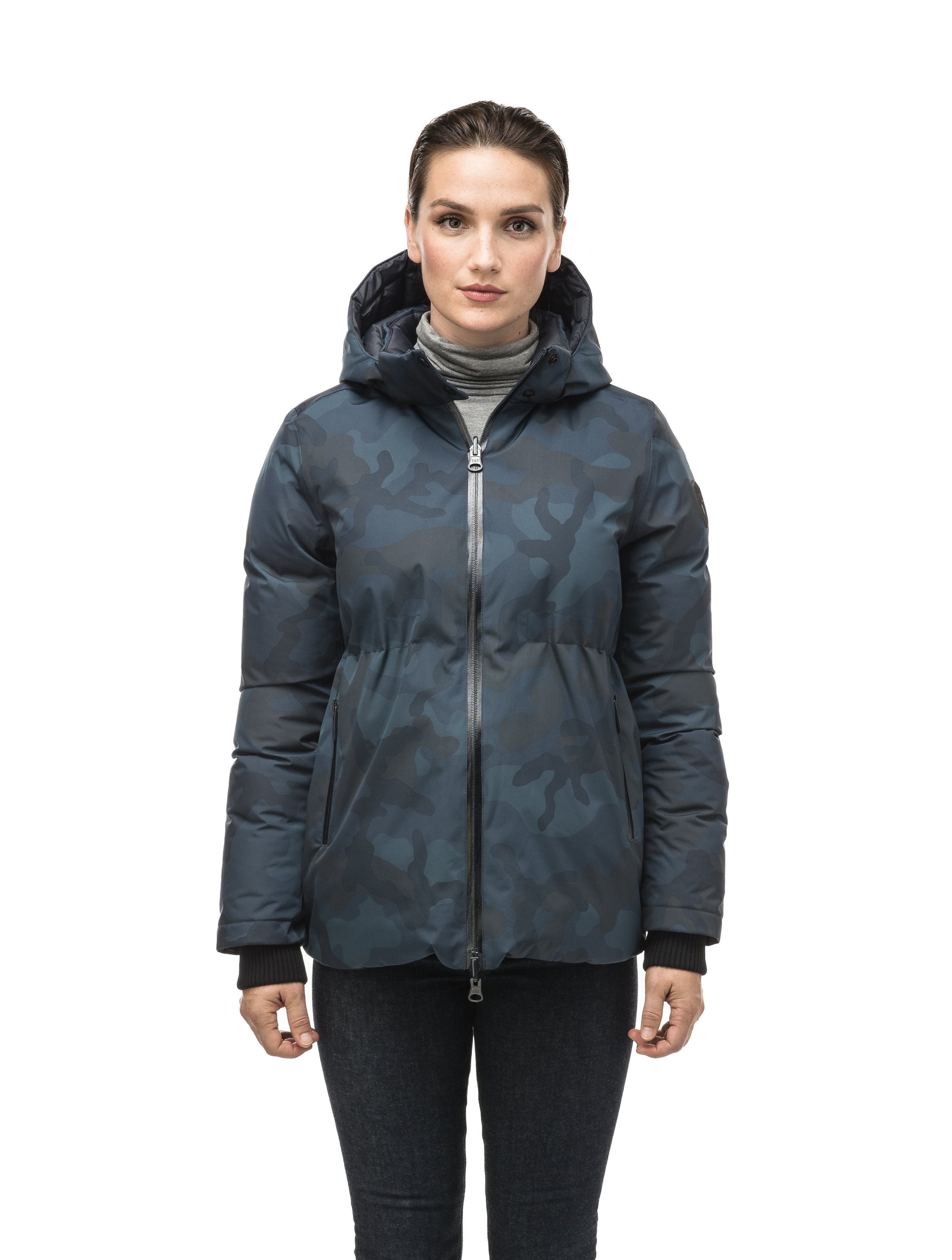 Hip length, reversible women's down filled jacket with waterproof exposed zipper in Navy Camo