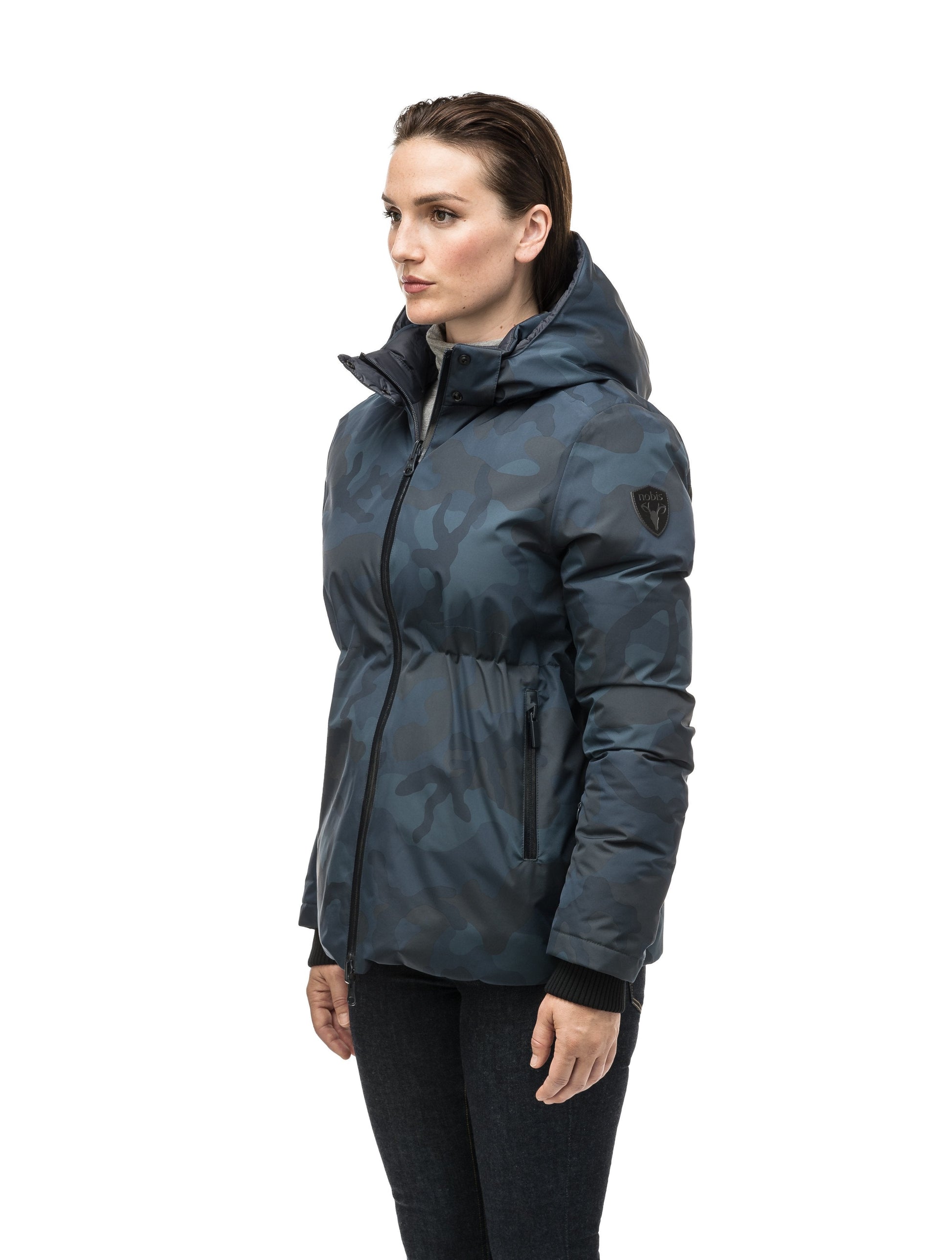 Hip length, reversible women's down filled jacket with waterproof exposed zipper in Navy Camo