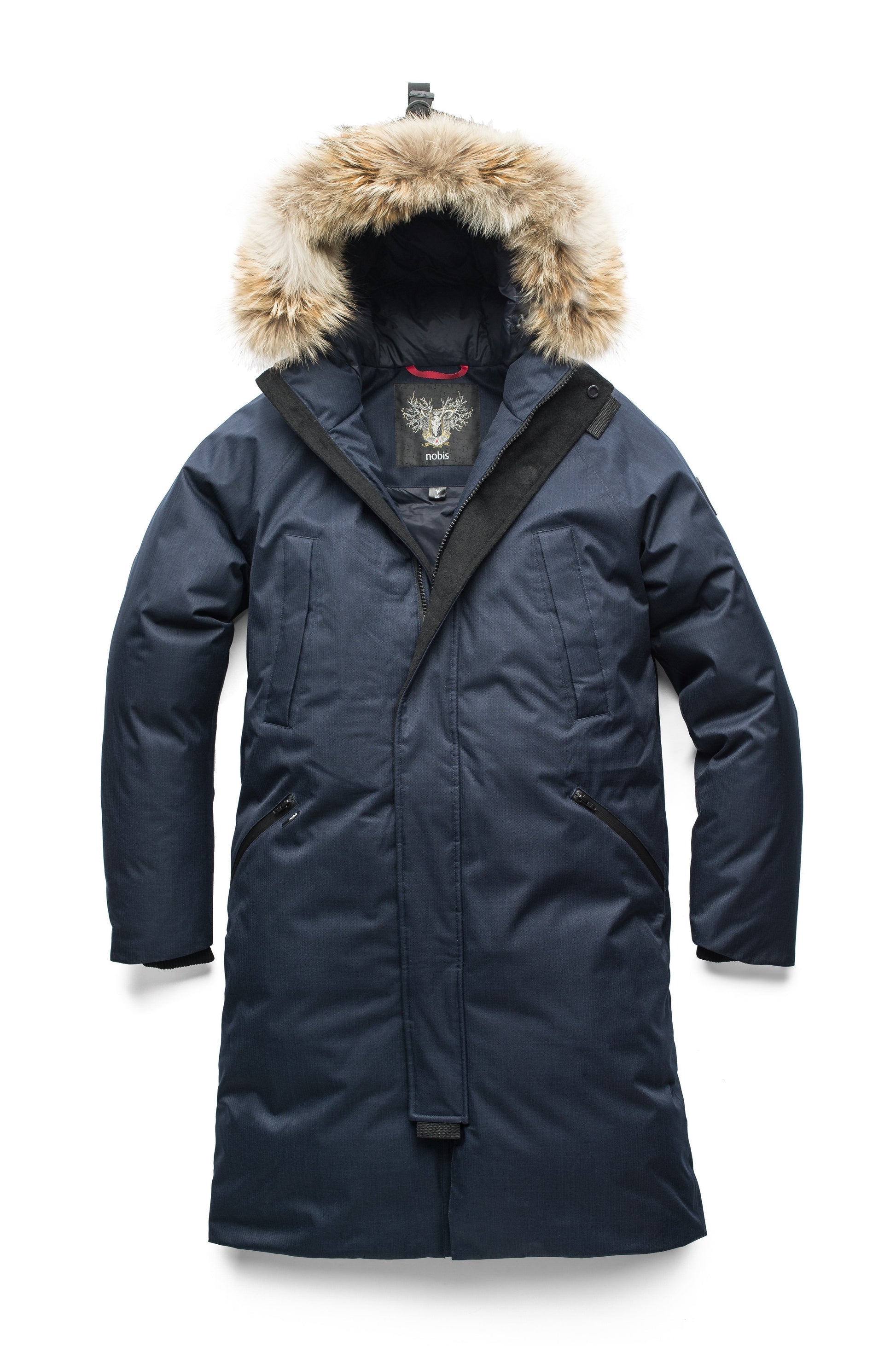 This ankle length men's down filled parka doubles as an over coat with a removable fur trim on the hood in Navy