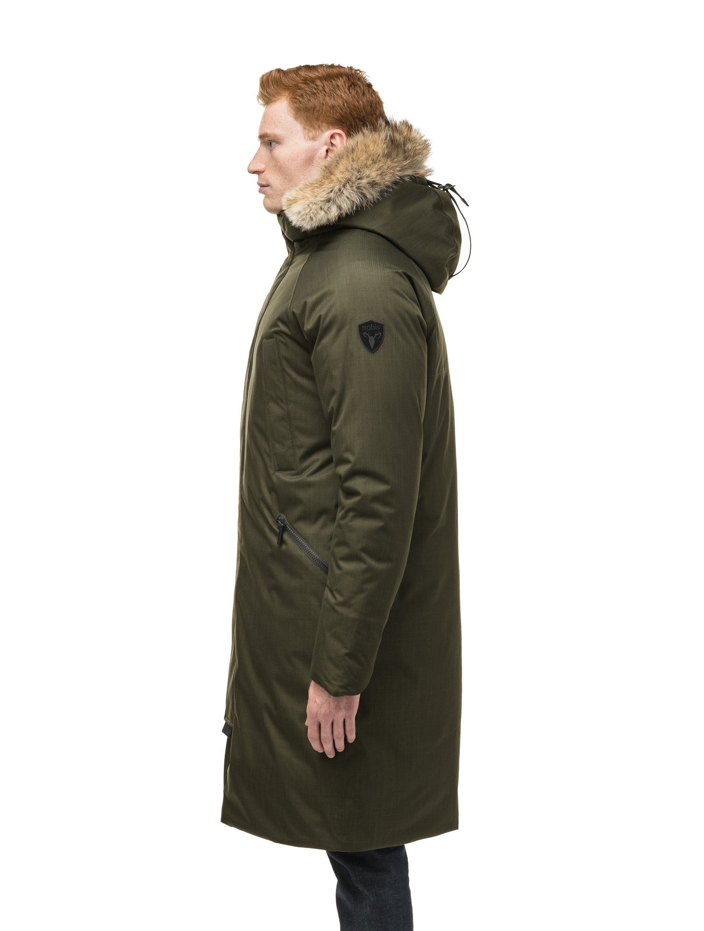 This ankle length men's down filled parka doubles as an over coat with a removable fur trim on the hood in Fatigue