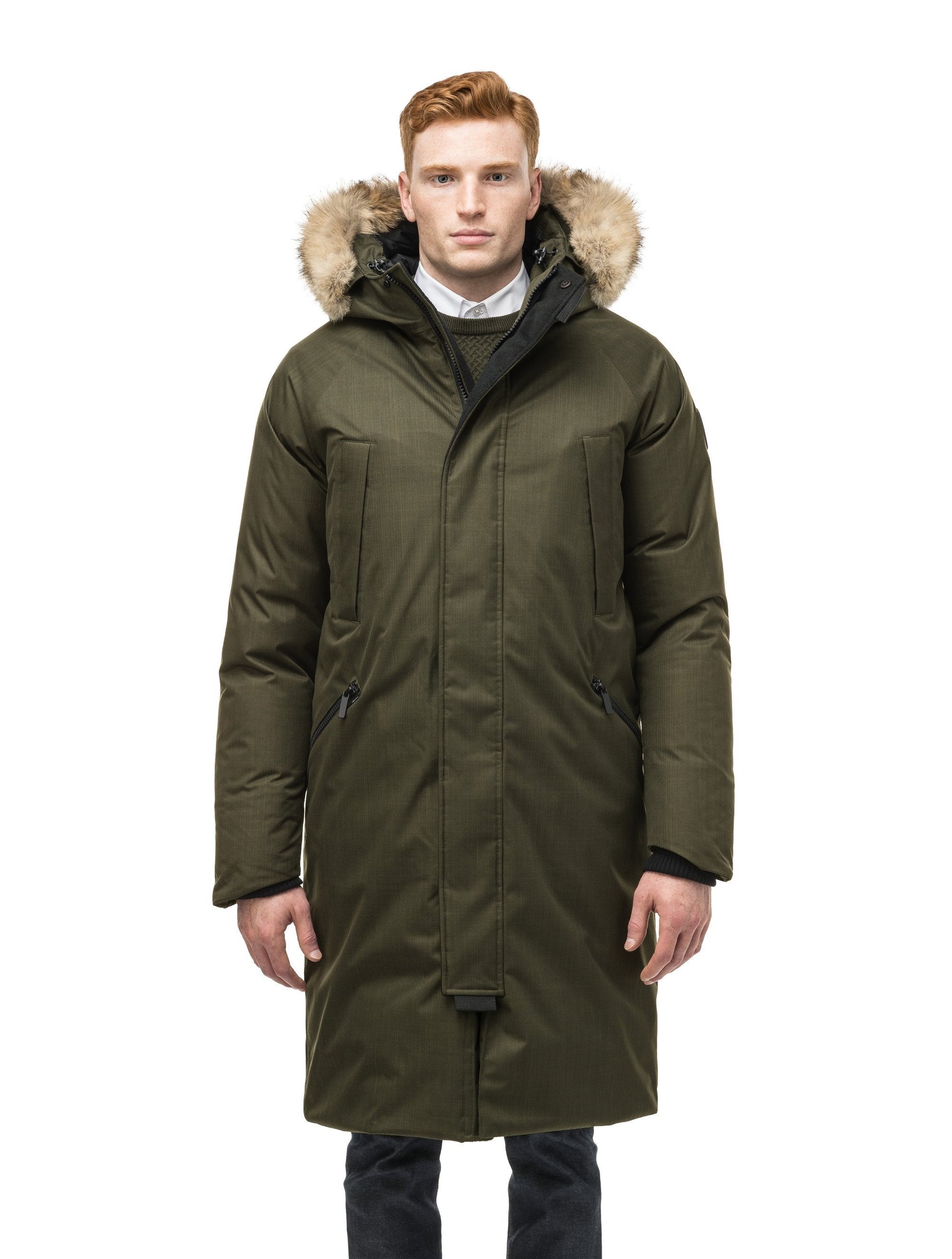 This ankle length men's down filled parka doubles as an over coat with a removable fur trim on the hood in Fatigue