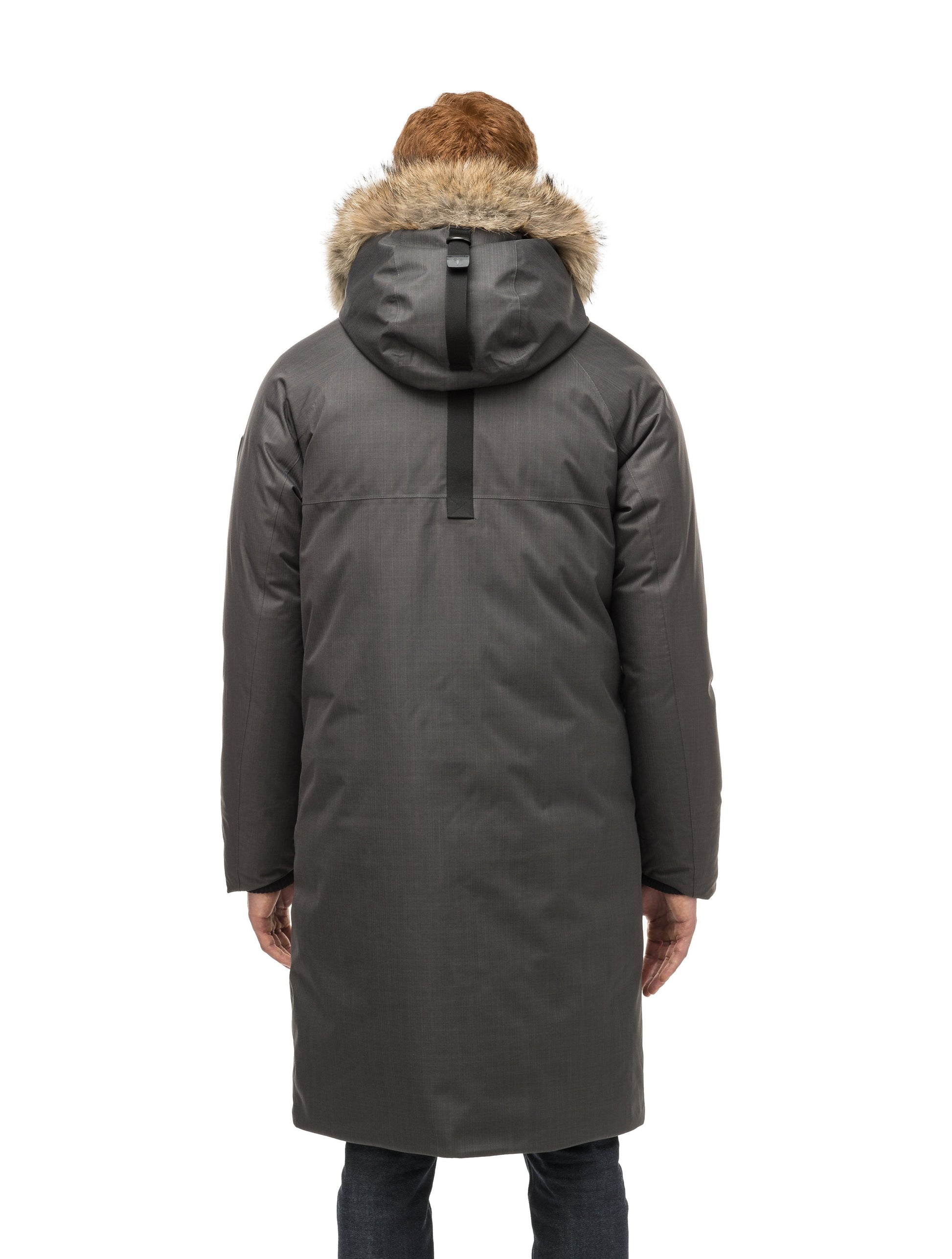 This ankle length men's down filled parka doubles as an over coat with a removable fur trim on the hood in Steel Grey