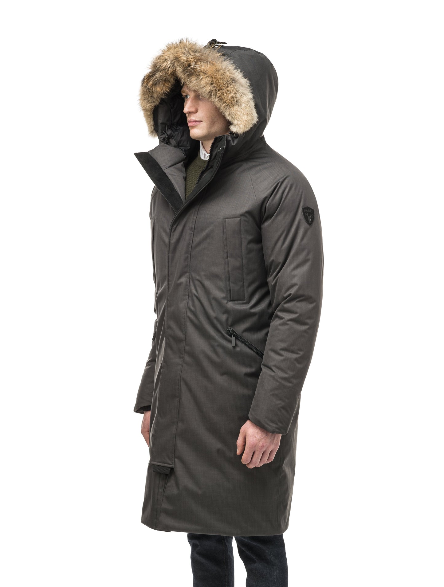 This ankle length men's down filled parka doubles as an over coat with a removable fur trim on the hood in Steel Grey