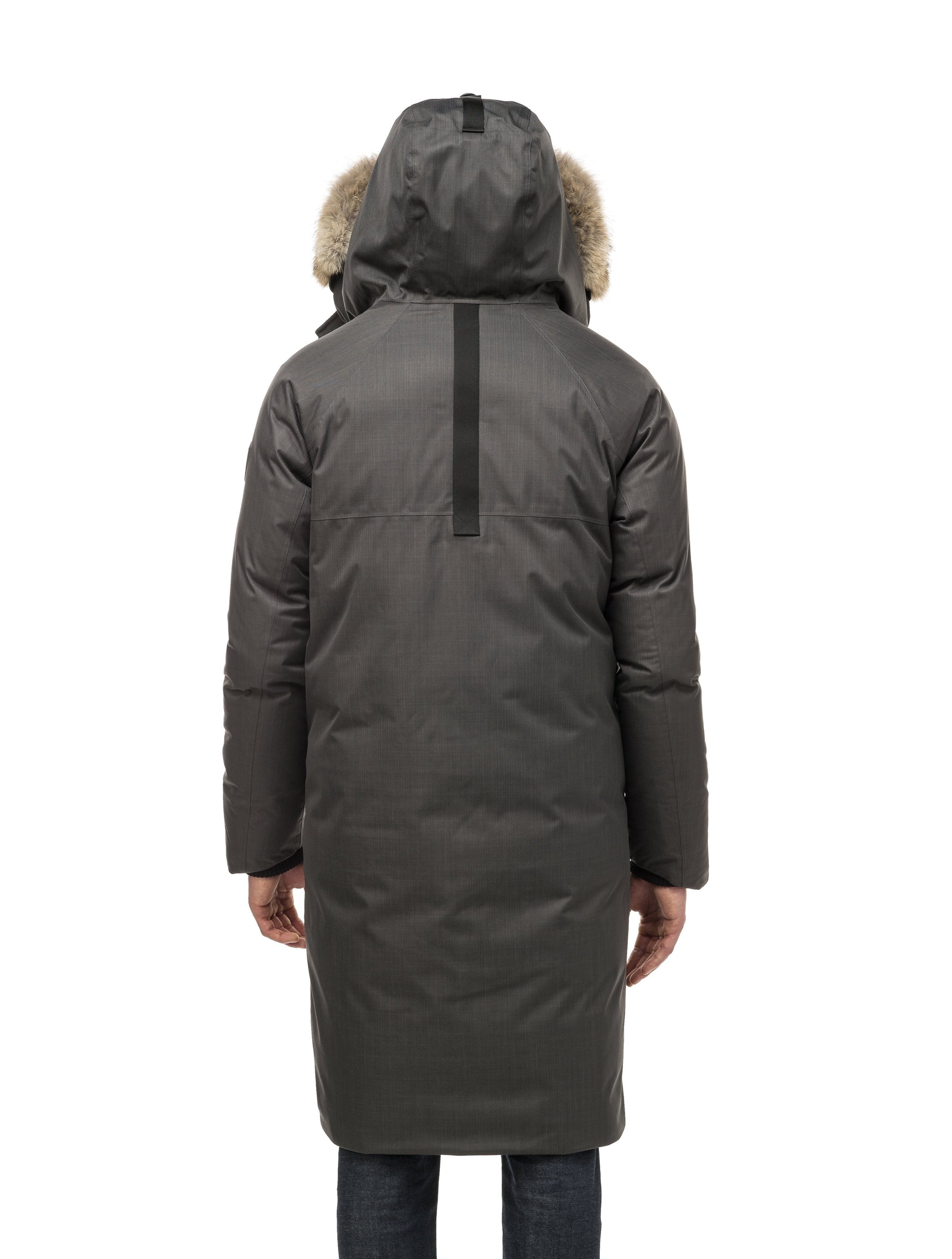 This ankle length men's down filled parka doubles as an over coat with a removable fur trim on the hood in Steel Grey