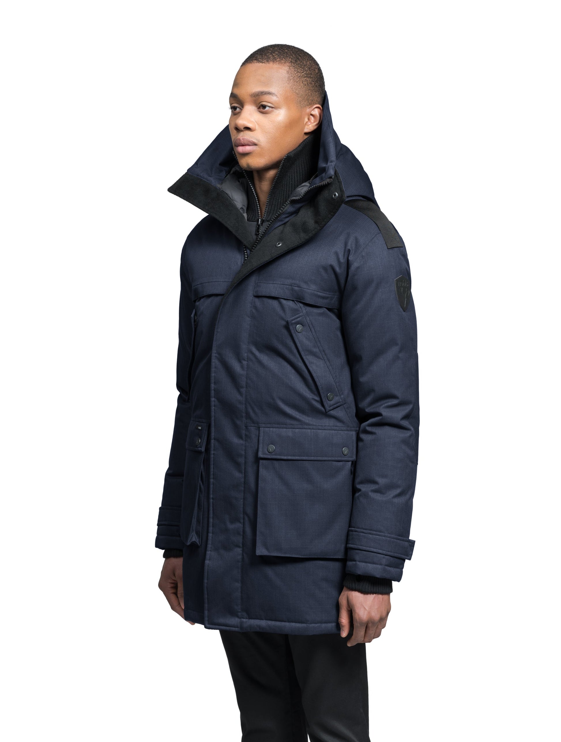 Men's Best Selling Parka the Yatesy is a down filled jacket with a zipper closure and magnetic placket in Navy