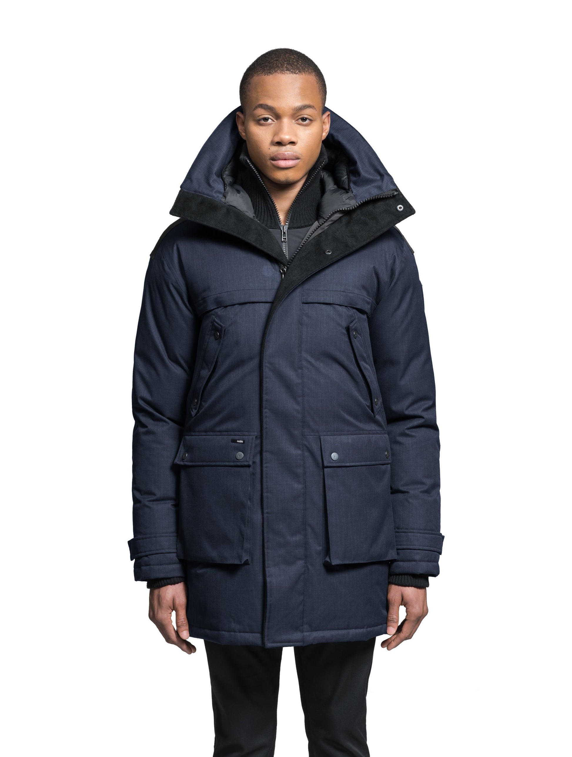 Men's Best Selling Parka the Yatesy is a down filled jacket with a zipper closure and magnetic placket in Navy