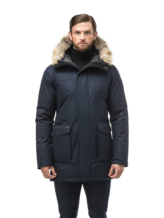 Men's slim fitting waist length parka with removable fur trim on the hood and two waist patch pockets in CH Navy