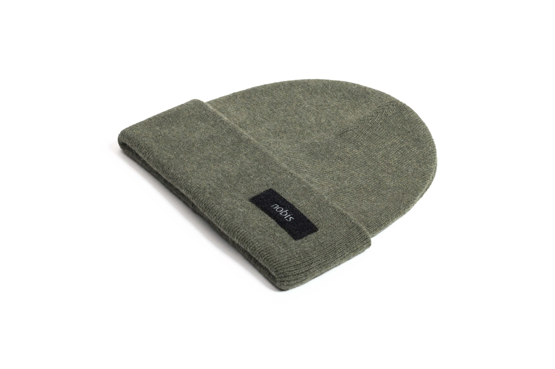 Dalia Unisex Jersey Knit Beanie in extrafine merino wool, and nobis label on cuff, in Evergreen