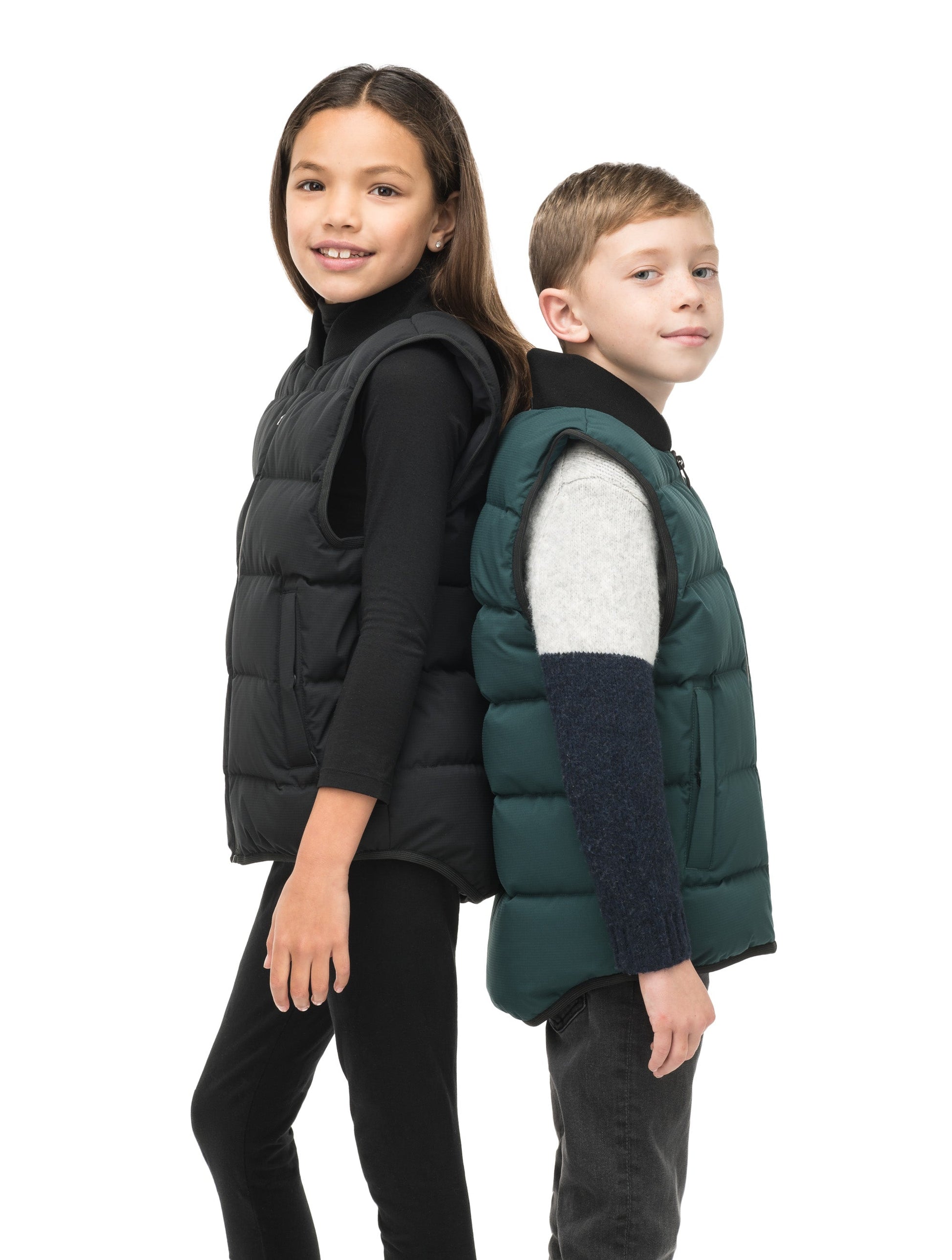 Little Pluto Kids Mid Layer Vest in hip length, Canadian duck down insulation, ribbed collar, two-way front zipper, and quilted body, in Pine