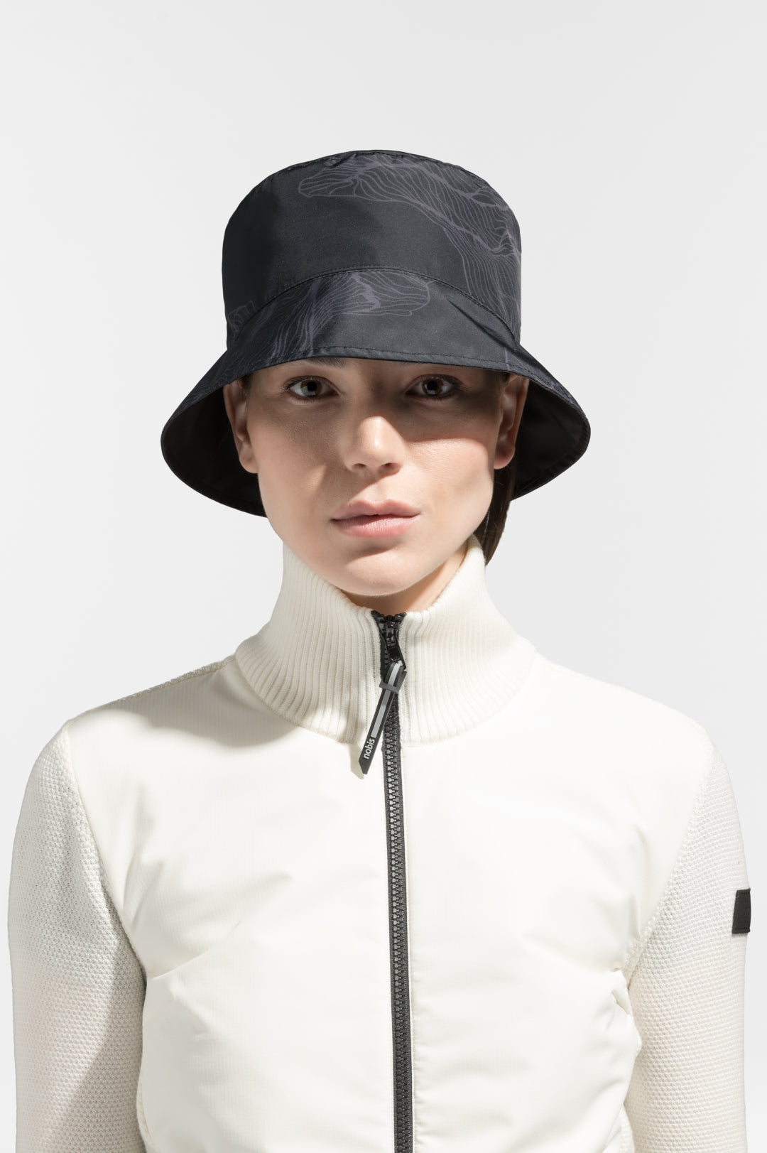 Kish Unisex Reversible Bucket Hat in Premium 3-Ply Micro Denier and 4-Way Durable Stretch Weave fabrications, with one side tonal and reverse printed, in Black Desert/Black