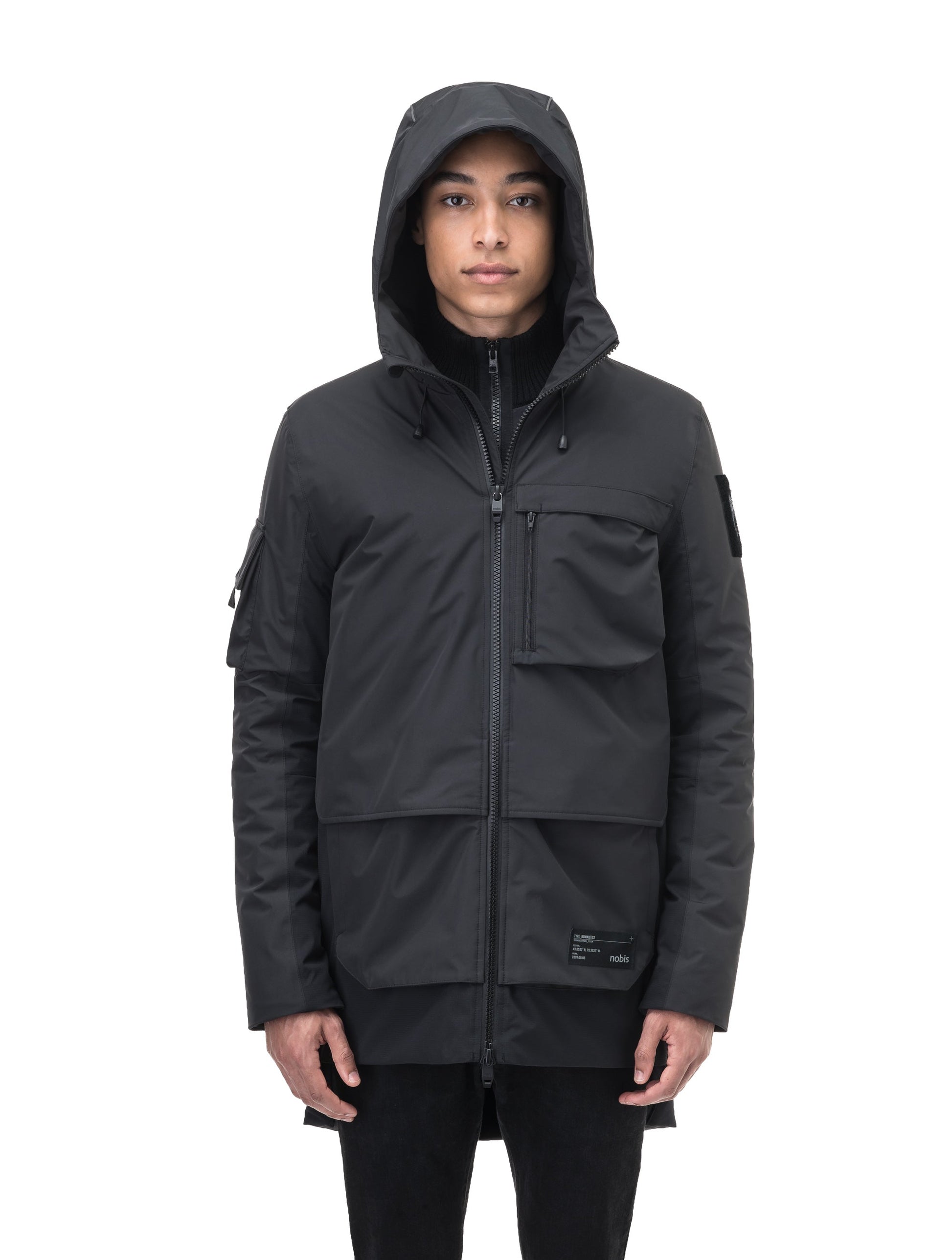 Alta Men's Performance Shell Jacket in hip length, Primaloft Gold Insulation Active+, chest and waist pockets, ventilation under arms, reflective detailing on hood and back, two-way front zipper, and non-removable hood with adjustable drawstrings, in Black