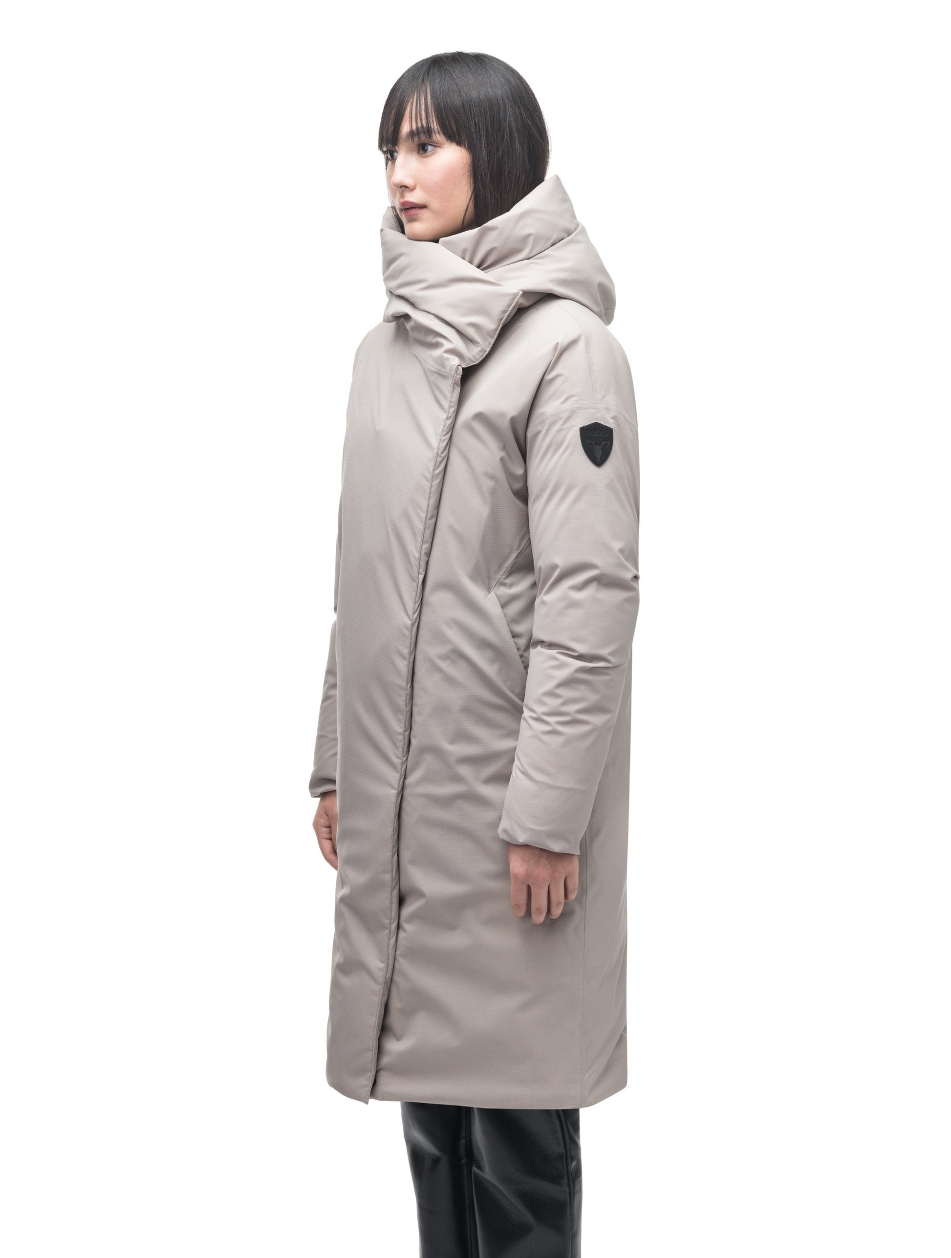 Axis Ladies Oversized Coat in knee length, Canadian duck down insulation, and two-way front zipper, in Clay