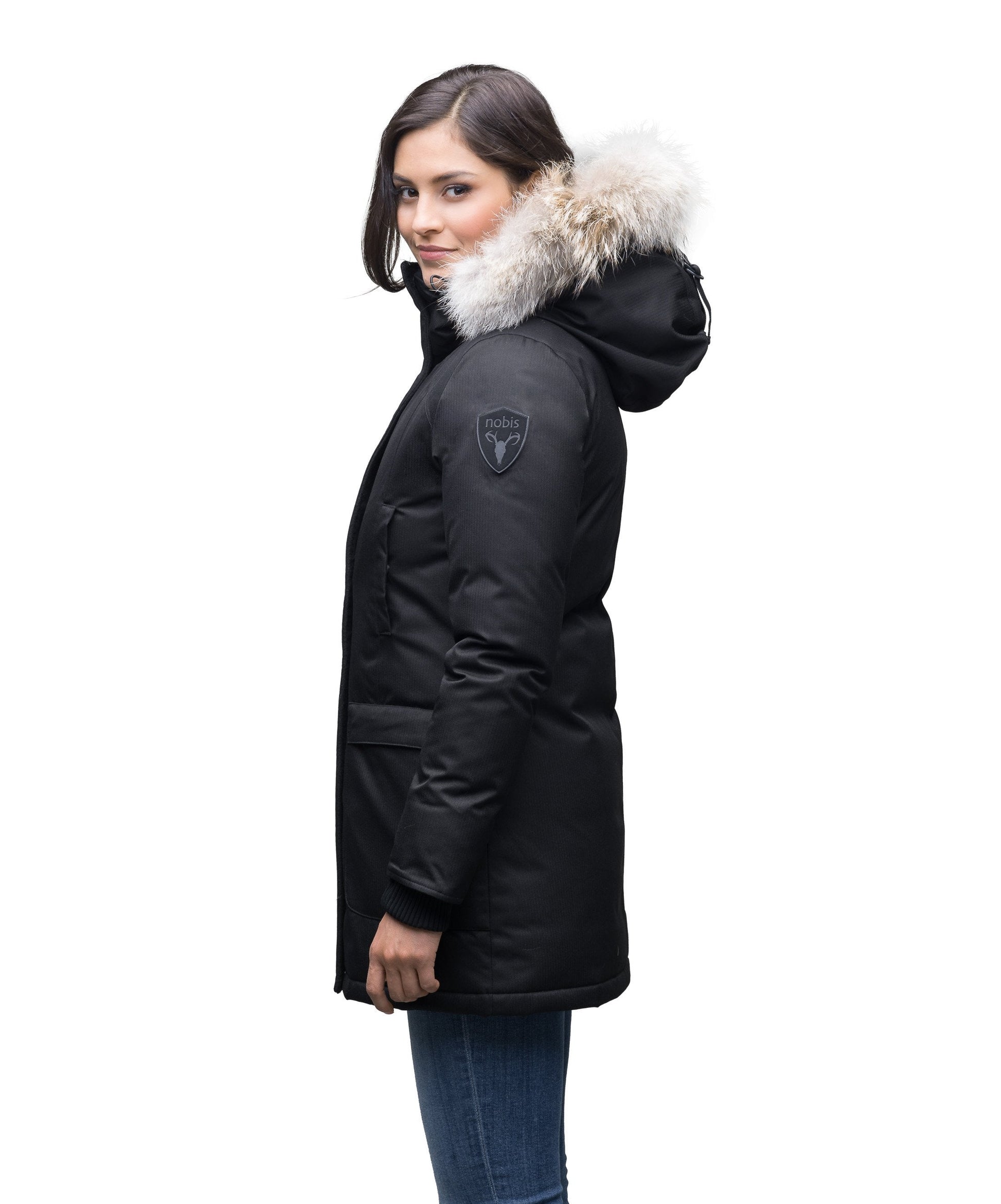 Women's down filled parka that sits just below the hip with a clean look and two hip patch pockets in CH Black