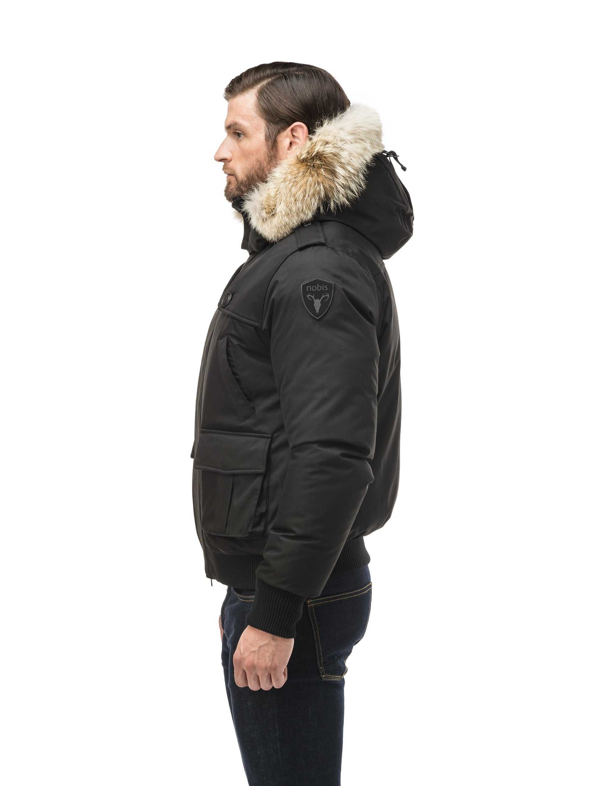 Men's down filled bomber that sits just above the hips with a completely removable hood that's windproof, waterproof, and breathable in Black