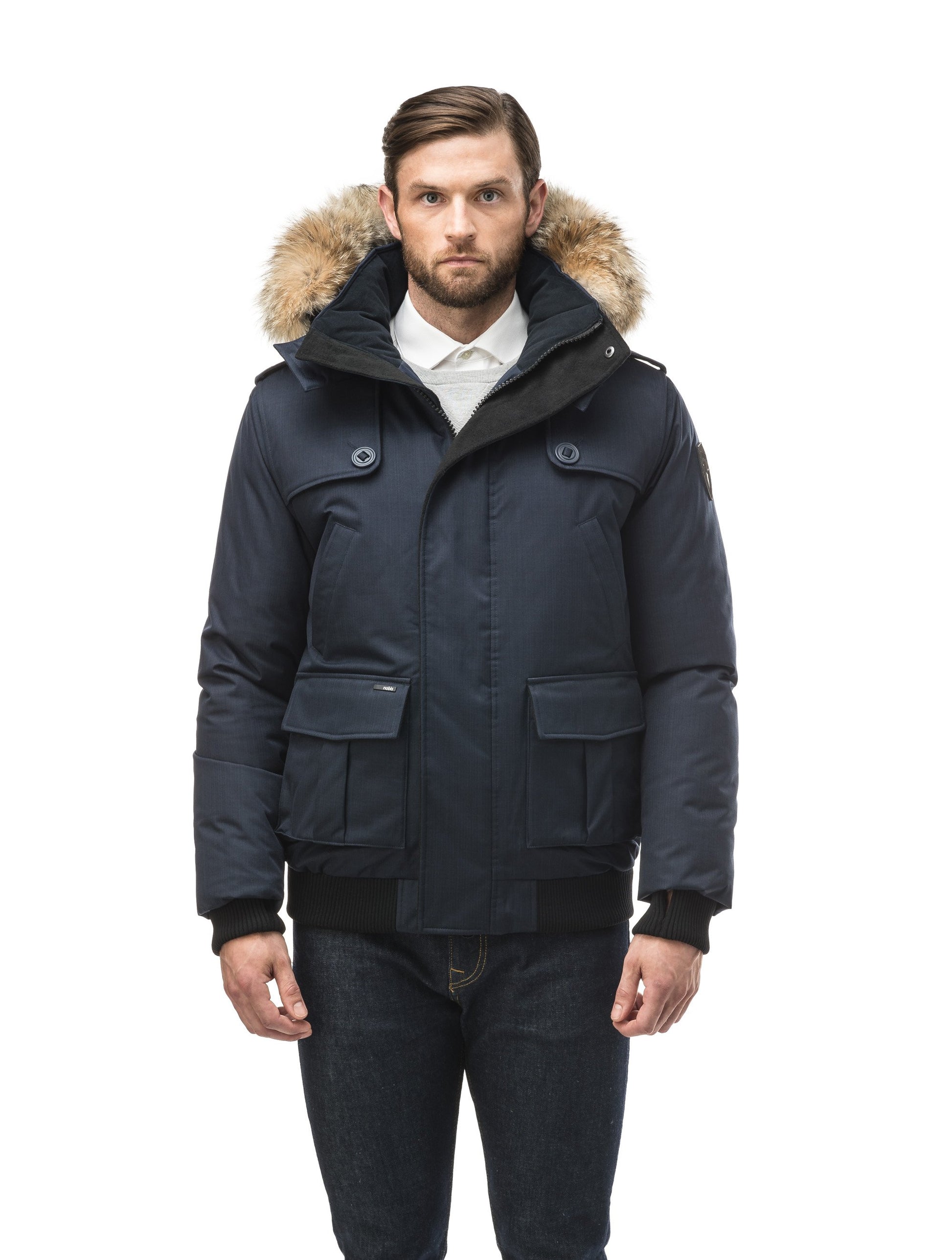 Men's down filled bomber that sits just above the hips with a completely removable hood thatÃ‚Â¡s windproof, waterproof, and breathable in CH Navy
