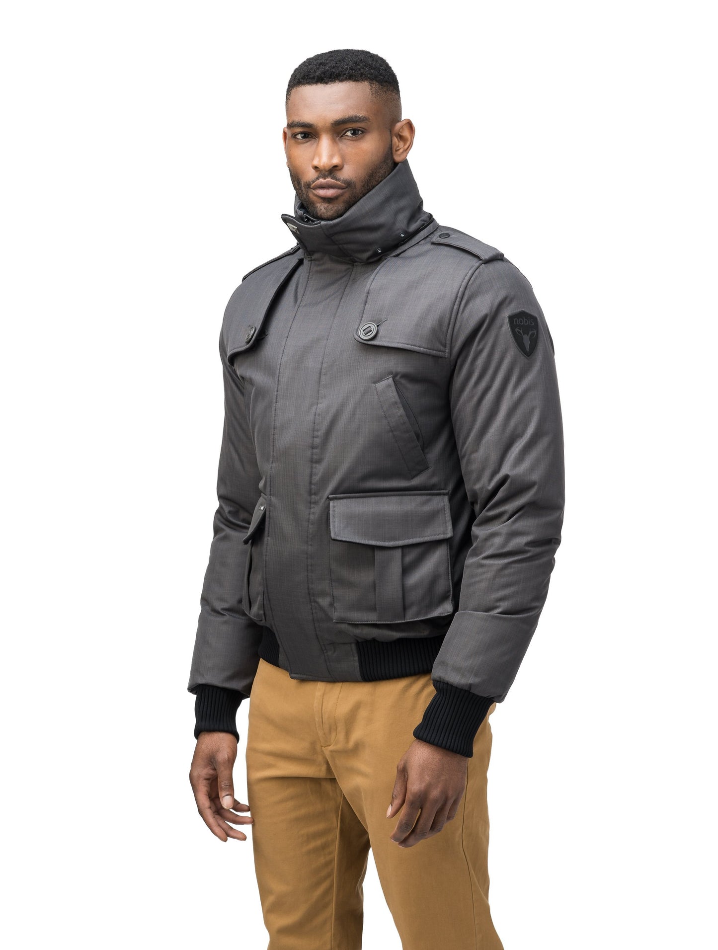 Men's down filled bomber that sits just above the hips with a completely removable hood that's windproof, waterproof, and breathable in CH Steel Grey