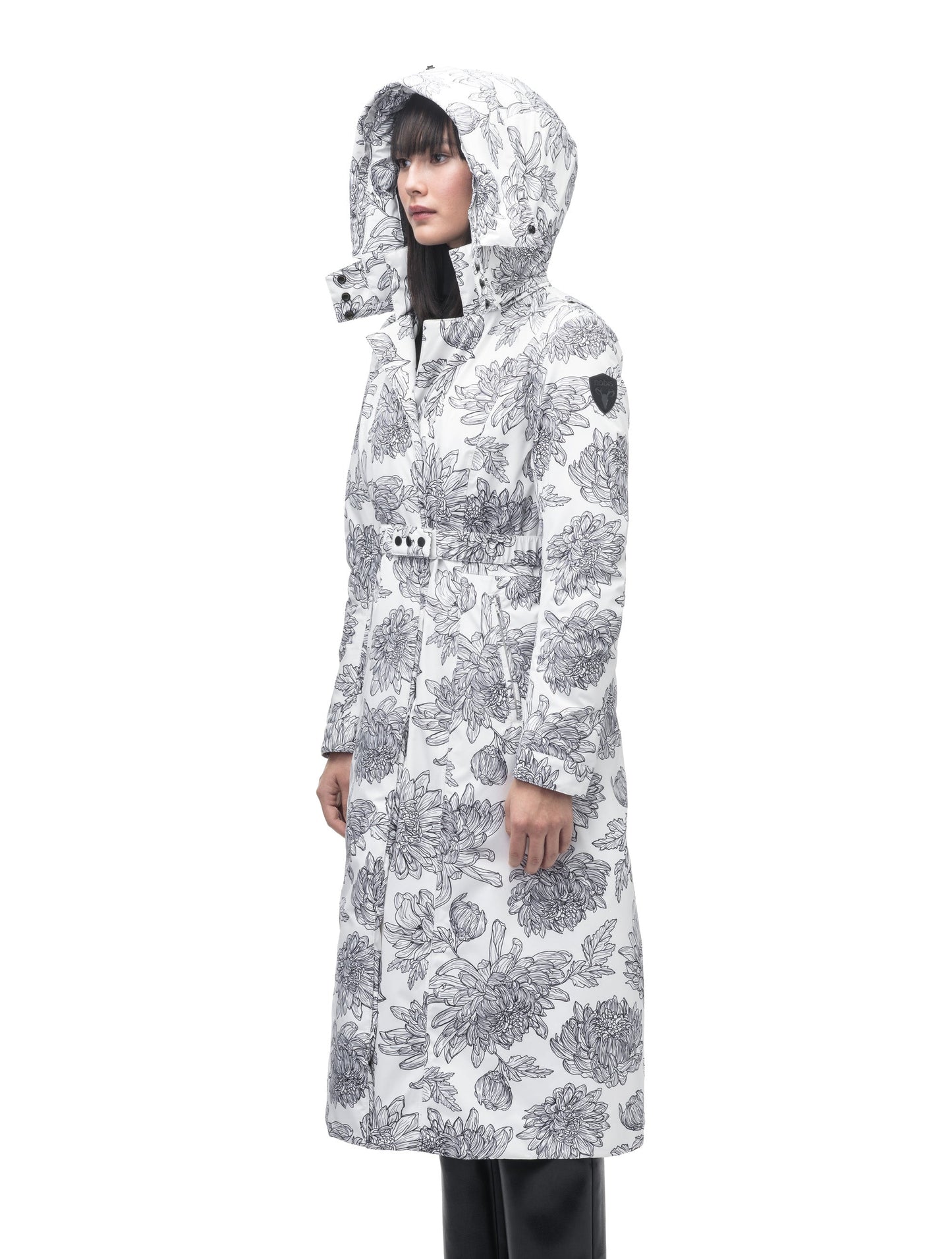 Celest Ladies Duster Parka in knee length, Canadian duck down insulation, removable hood and coyote fur trim, with adjustable belt, in White Floral