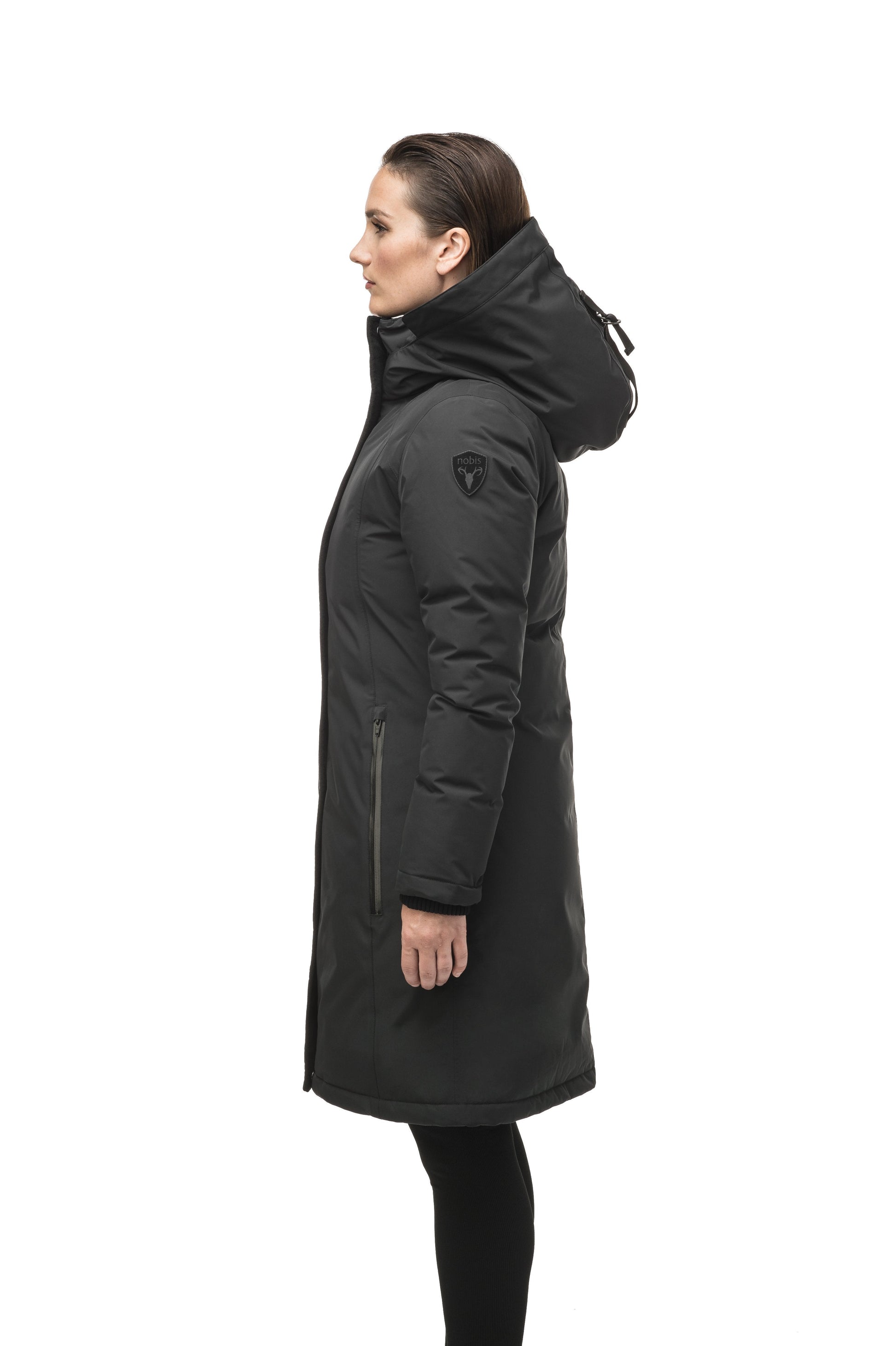 Minimalist down filled women's parka with fur free attached hood in Black
