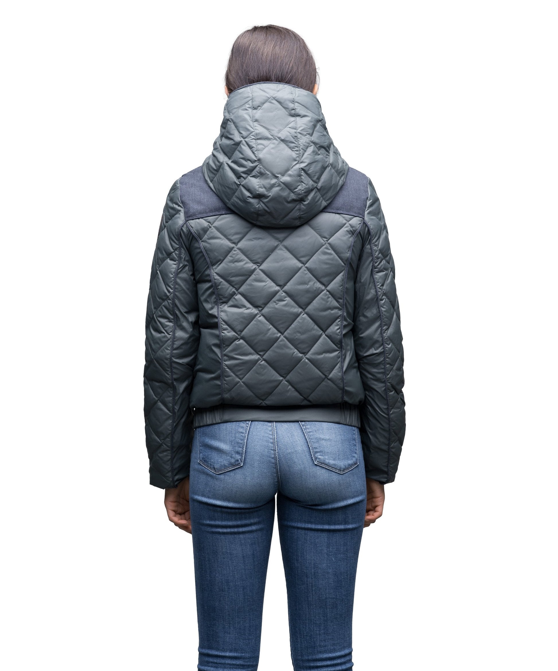 Lightweight women's jacket with hood and quilted pattern featuring a contrasting upper fabric in Foggy Blue