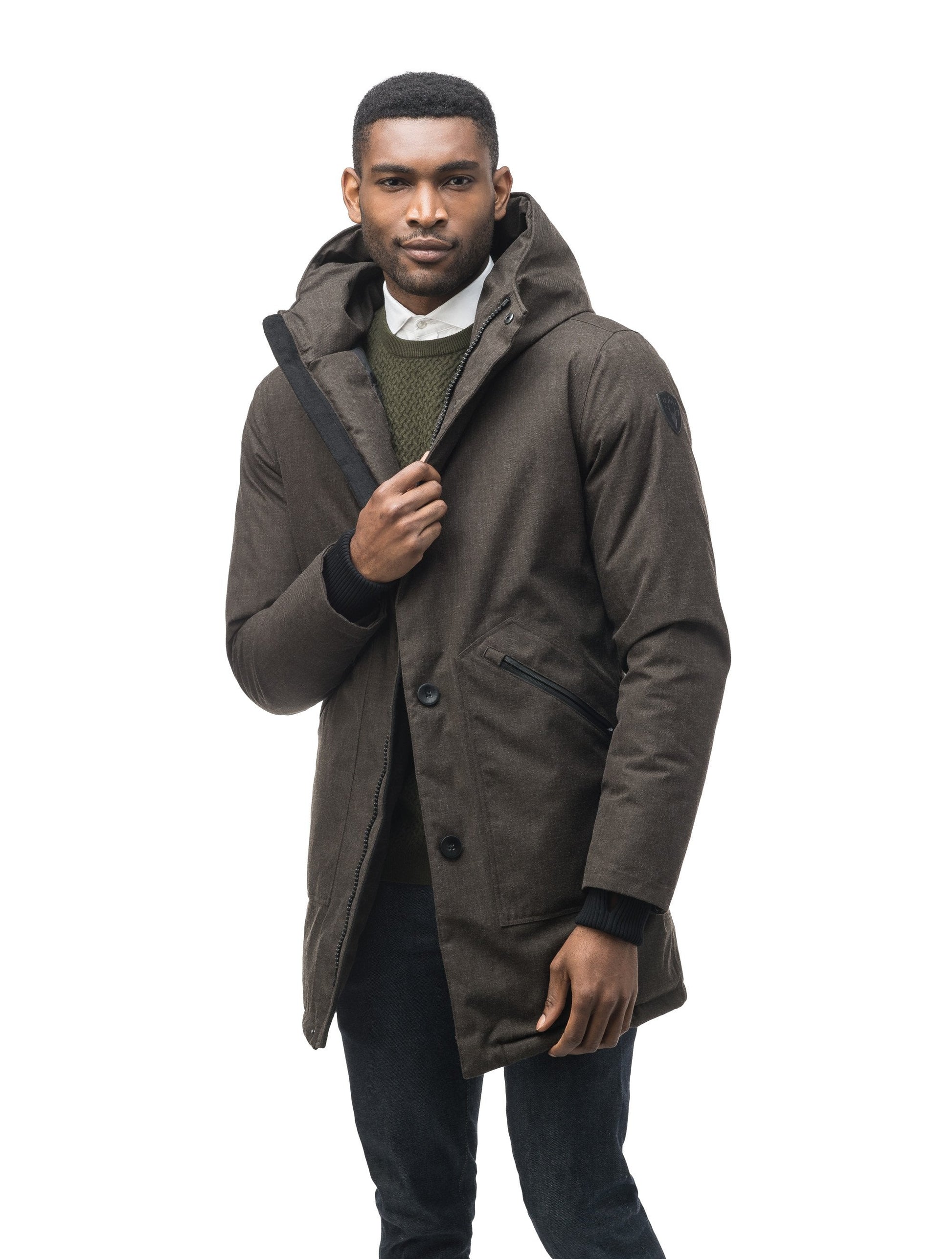 Men's fur free hooded parka with zipper and button closure placket featuring two oversized front pockets in H. Brown