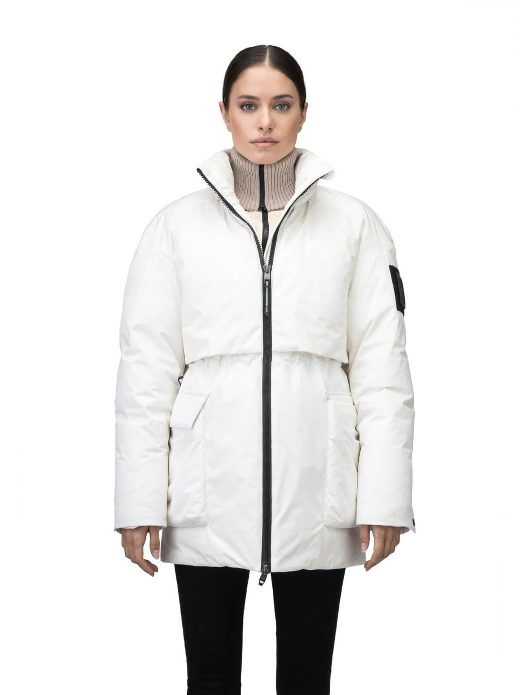 Haelyn Ladies Short Utility Parka in thigh length, 3-Ply Micro Denier fabrication, Premium Canadian White Duck Down insulation, removable down-filled hood, two-way centre front zipper, hidden adjustable cord at waist, adjustable snap cuffs, and four exterior patch pockets at front, in Wheat Desert