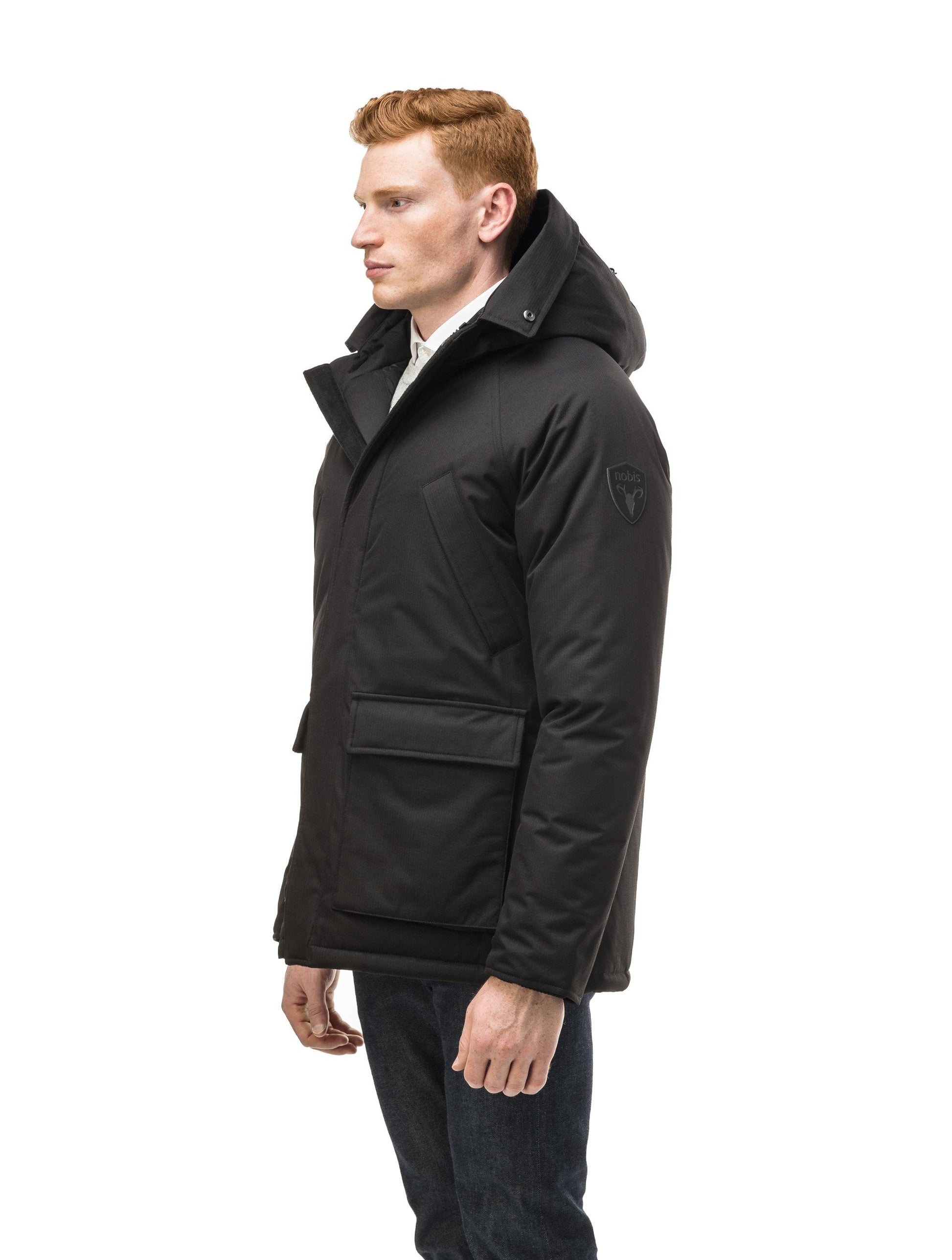 Men's waist length down filled jacket with two front pockets with magnetic closure and a removable fur trim on the hood in CH Black