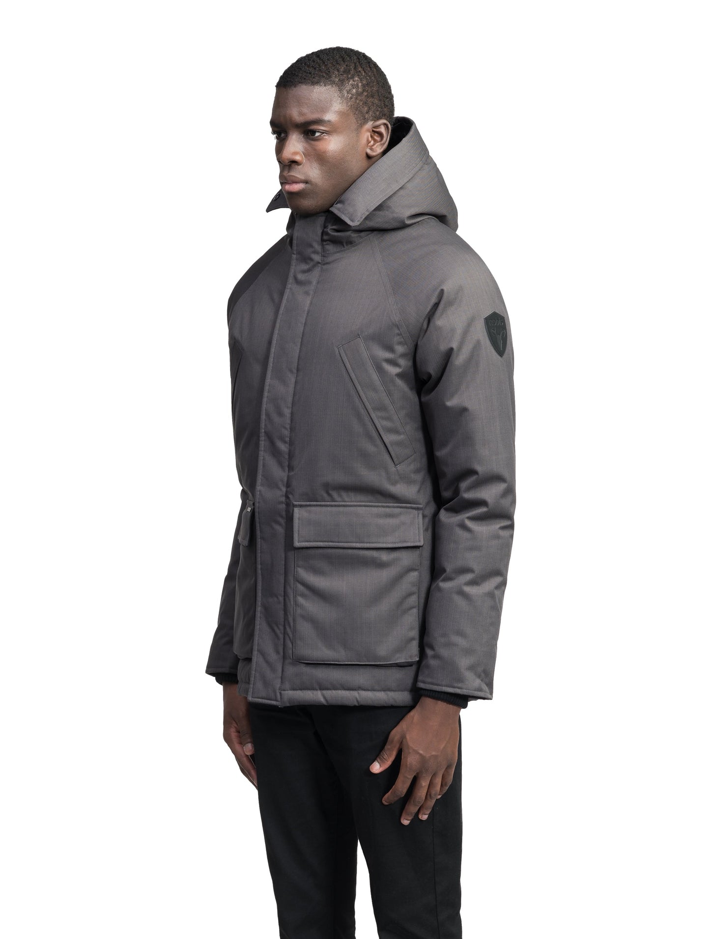 Heritage Furless Men's Parka in hip length, Canadian white duck down insulation, non-removable hood, front zipper with magnetic placket, chest hand warmer pockets, waist flap pockets, and elastic cuffs, in Steel Grey