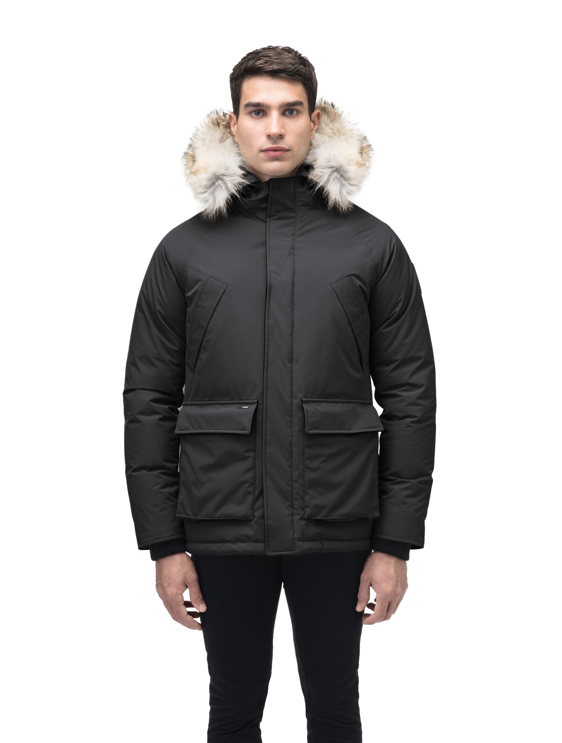 Men's waist length down filled jacket with two front pockets with magnetic closure and a removable fur trim on the hood in Cy Black