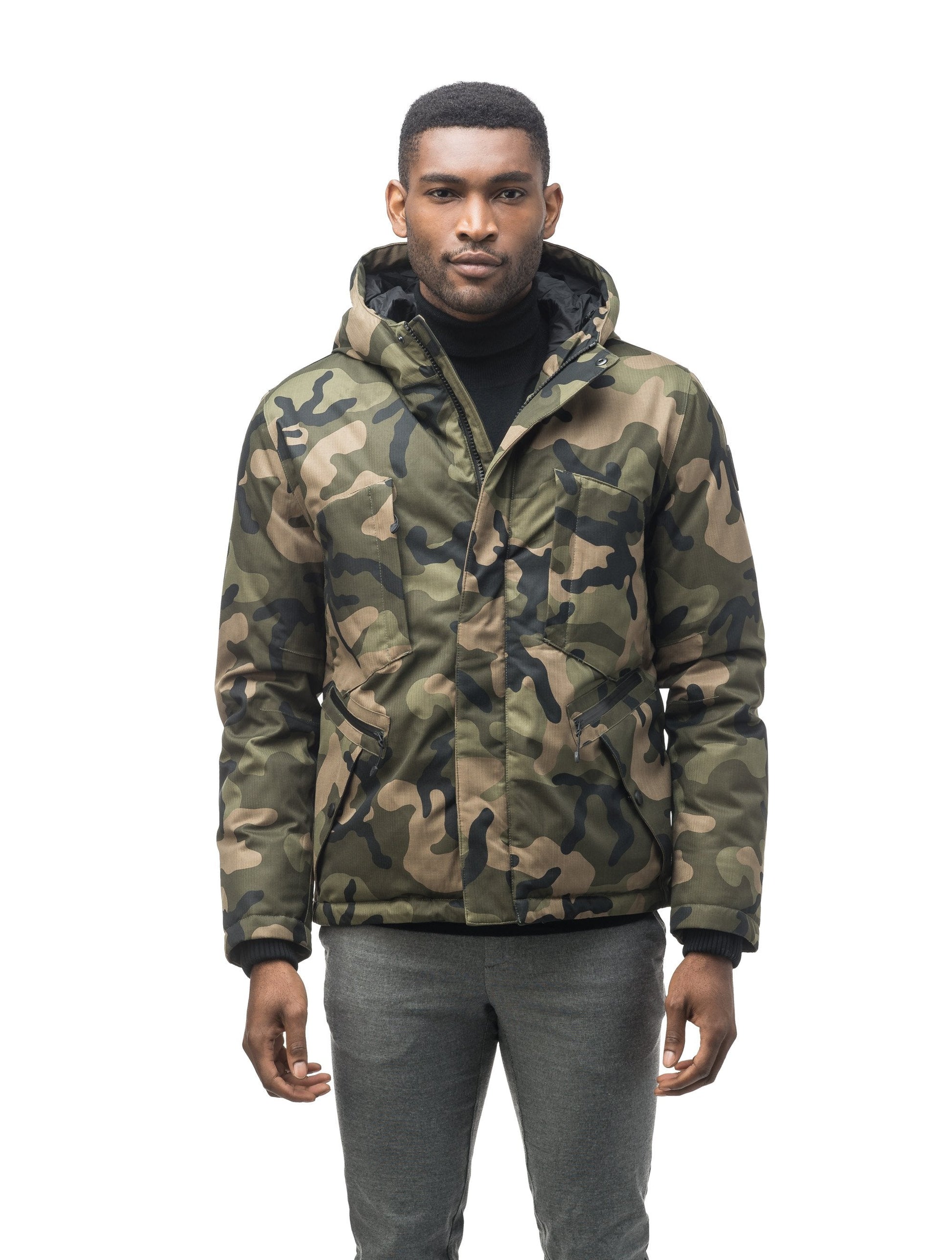 Men's waist length light down coat equipped with six exterior pockets and a hood in Camo