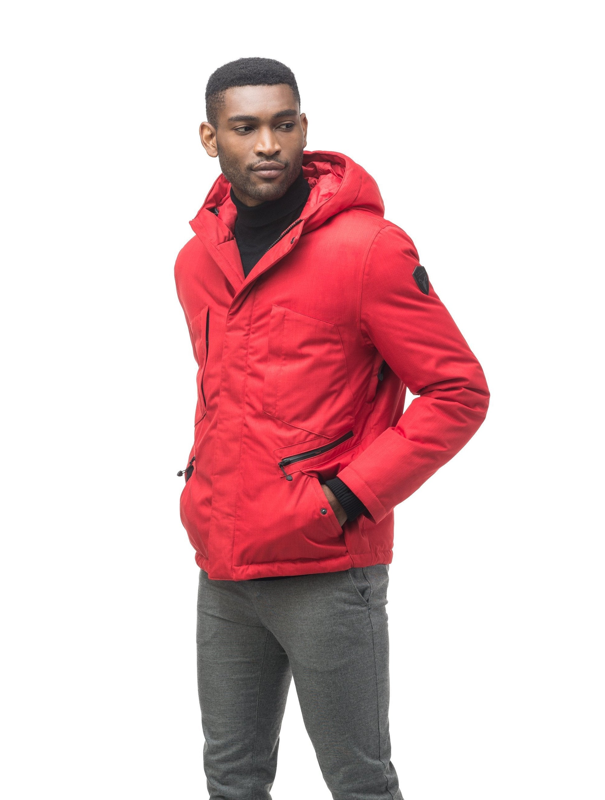 Men's waist length light down coat equipped with six exterior pockets and a hood in Red