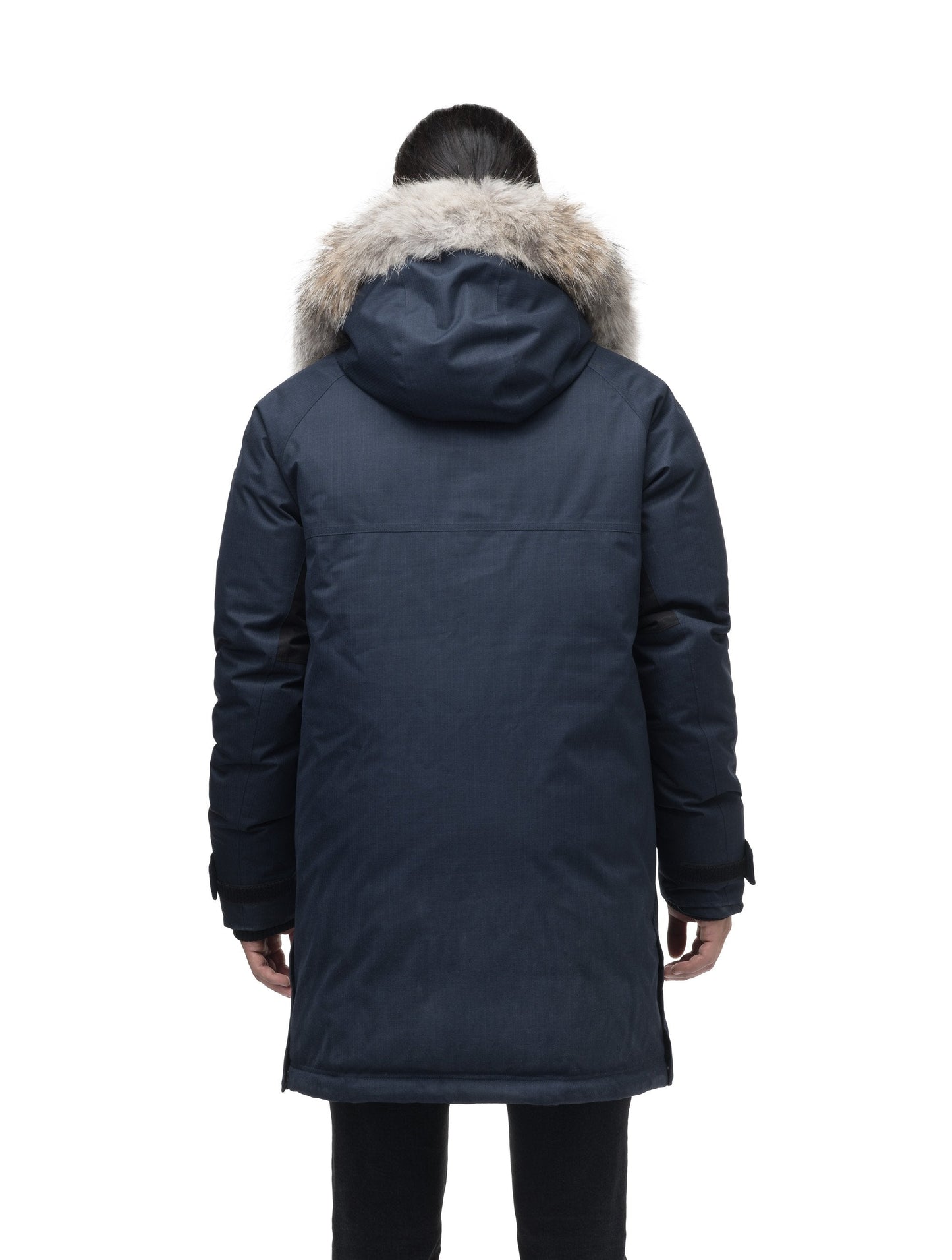 Men's thigh length down-filled parka with removable hood and removable coyote fur trim in Navy