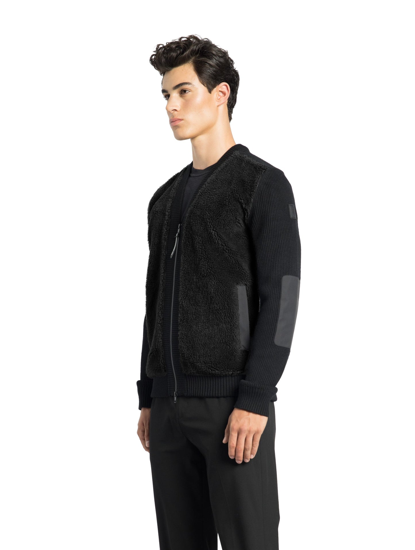 Doyen Men's Hybrid Berber V-Neck Jacket in hip length, premium berber and 100% extra fine merino wool knit fabrication, Primaloft Gold Insulation Active+, two-way centre-front zipper, side-entry pockets at waist, in Black