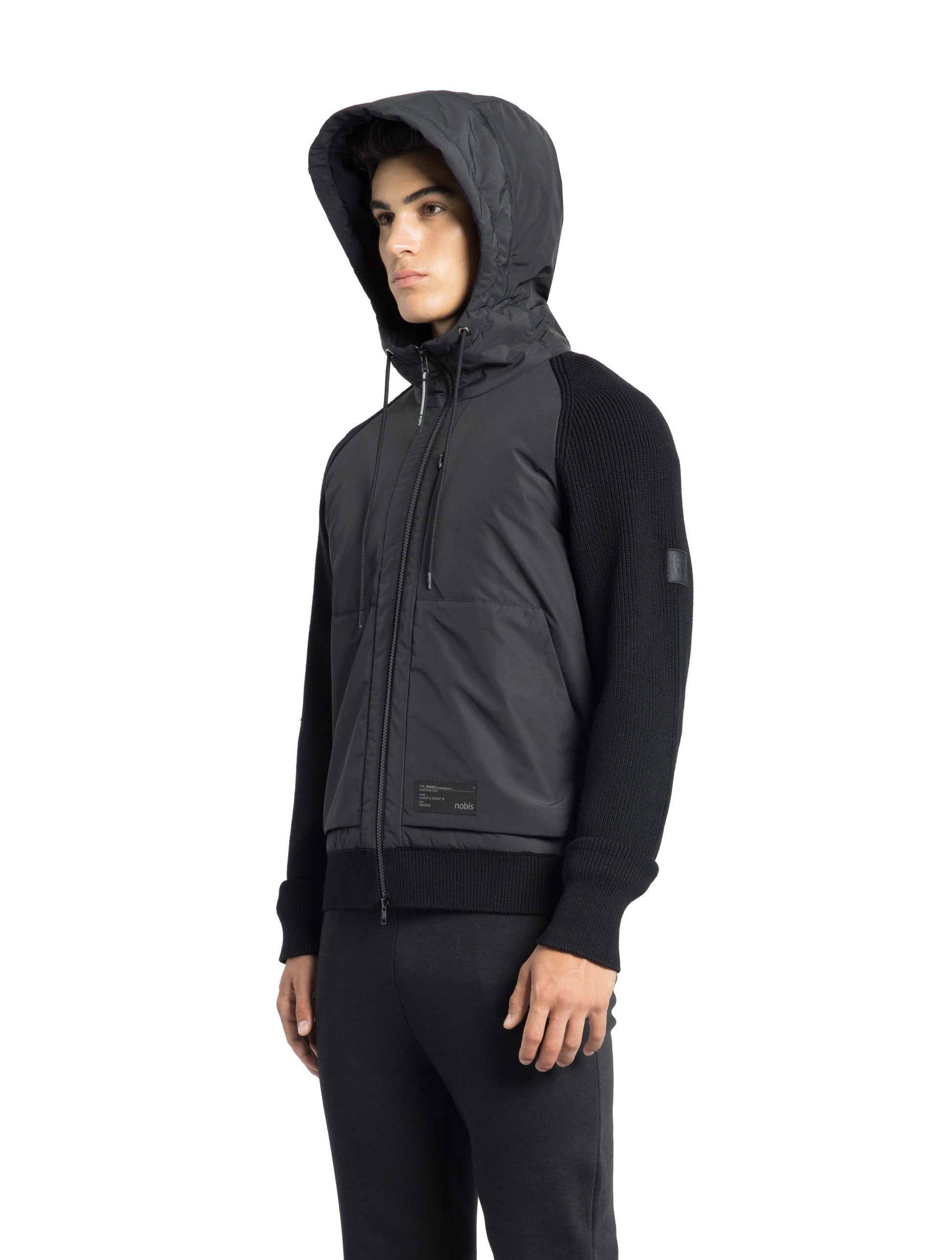 Hedge Men's Performance Hoodie in hip length, premium 3-ply micro denier and 100% virgin extra fine merino wool knit fabrication, Primaloft Gold Insulation Active+, non-removable hood with adjustable drawstrings, two-way centre-front zipper, magnetic closure side-entry pockets at waist, in Black