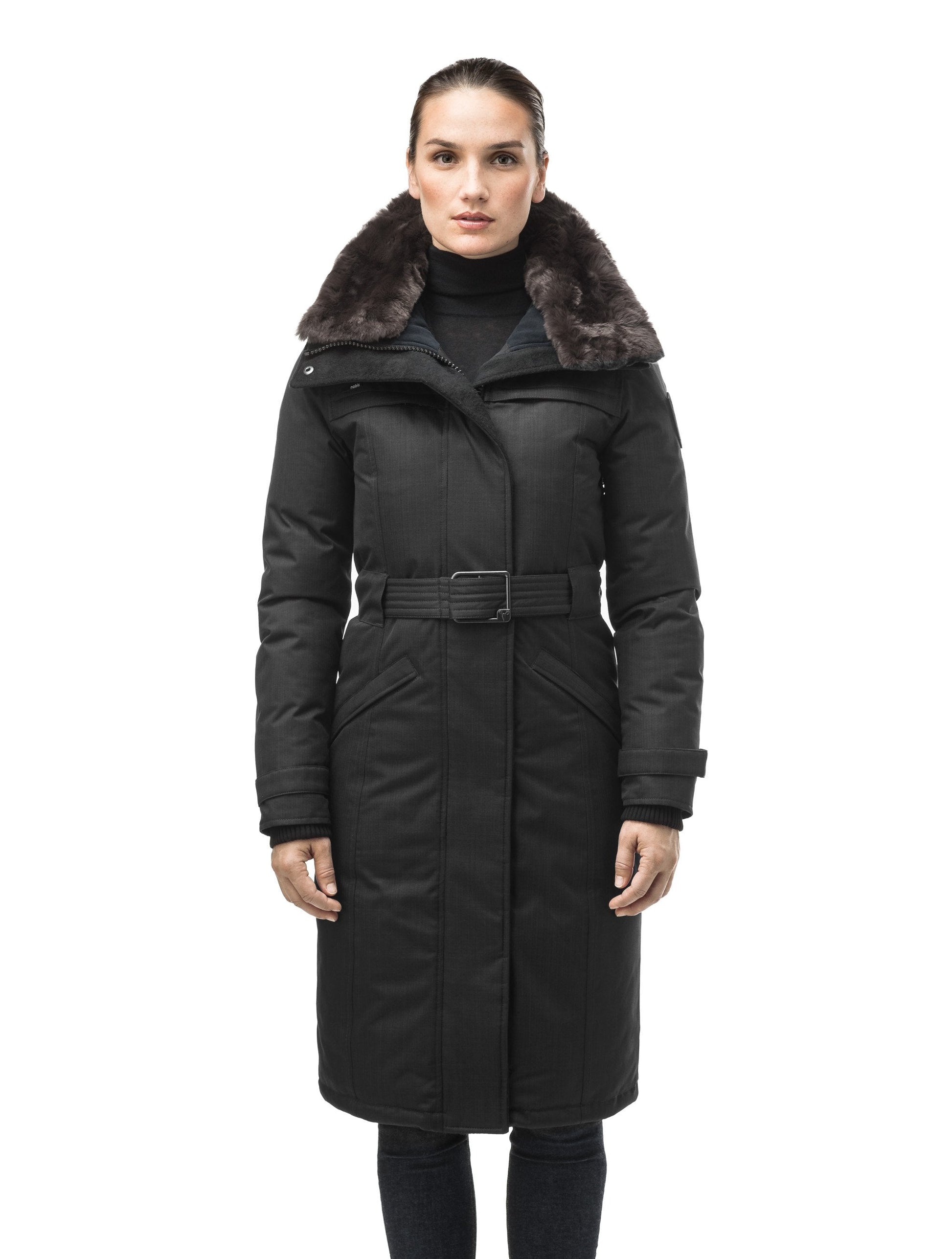 Women's knee length down filled parka with a belted waist and fully removable Coyote and Rex Rabbit fur ruffs in CH Black