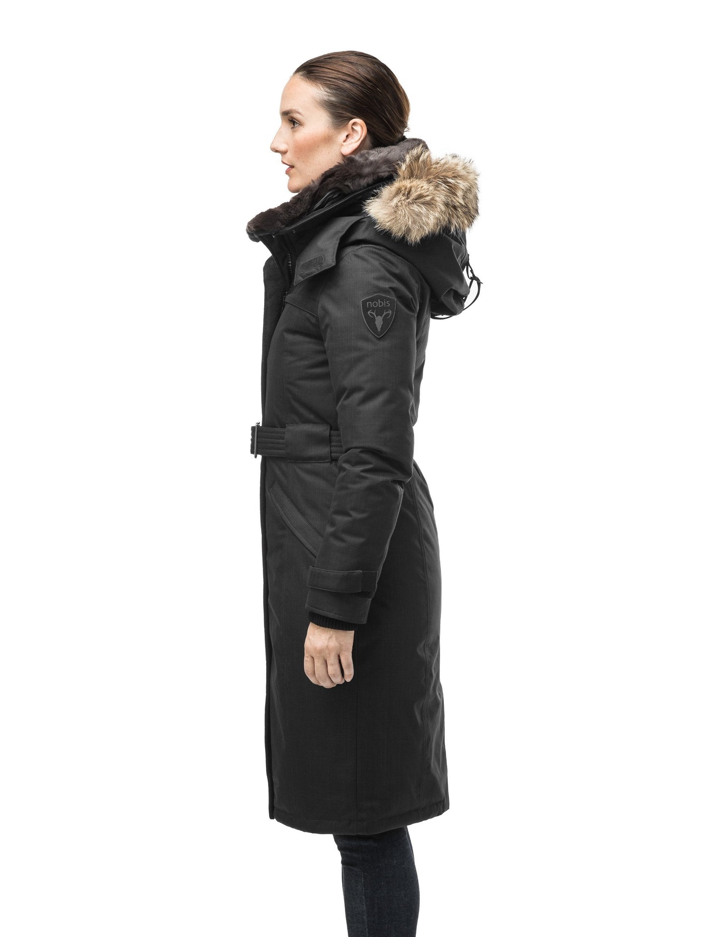 Women's knee length down filled parka with a belted waist and fully removable Coyote and Rex Rabbit fur ruffs in CH Black