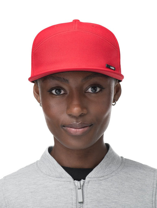 Unisex 7-panel snapback hat with flat brim and structured crown in Red