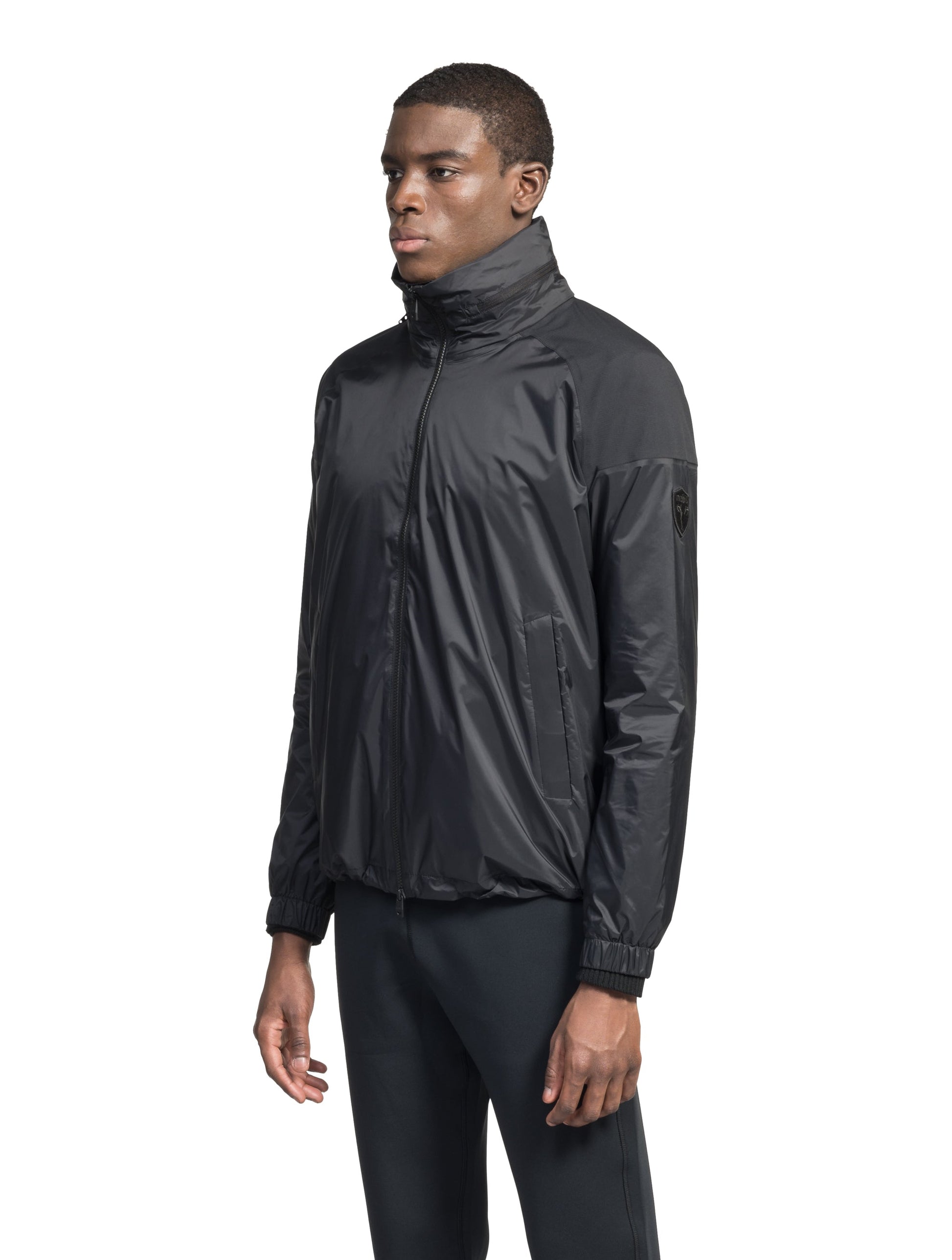 Men's hip length waterproof jacket with tuckable hood and 2-way zipper in Black